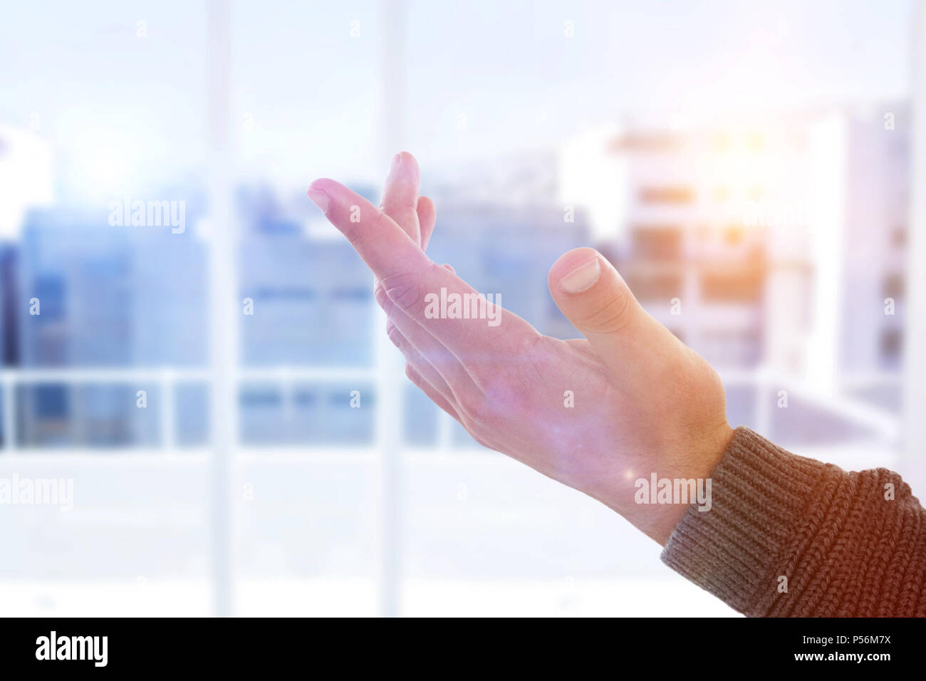 Das zusammengesetzte Bild von Hand Geste gegen den weißen Hintergrund Stockfoto