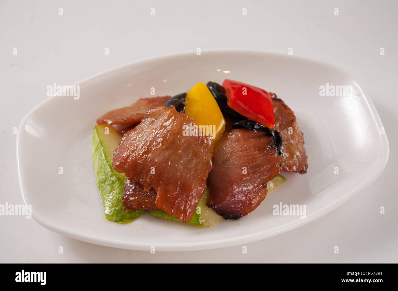Gegrilltes Schweinefleisch gebraten mit Melone, Chinesische Küche Stockfoto