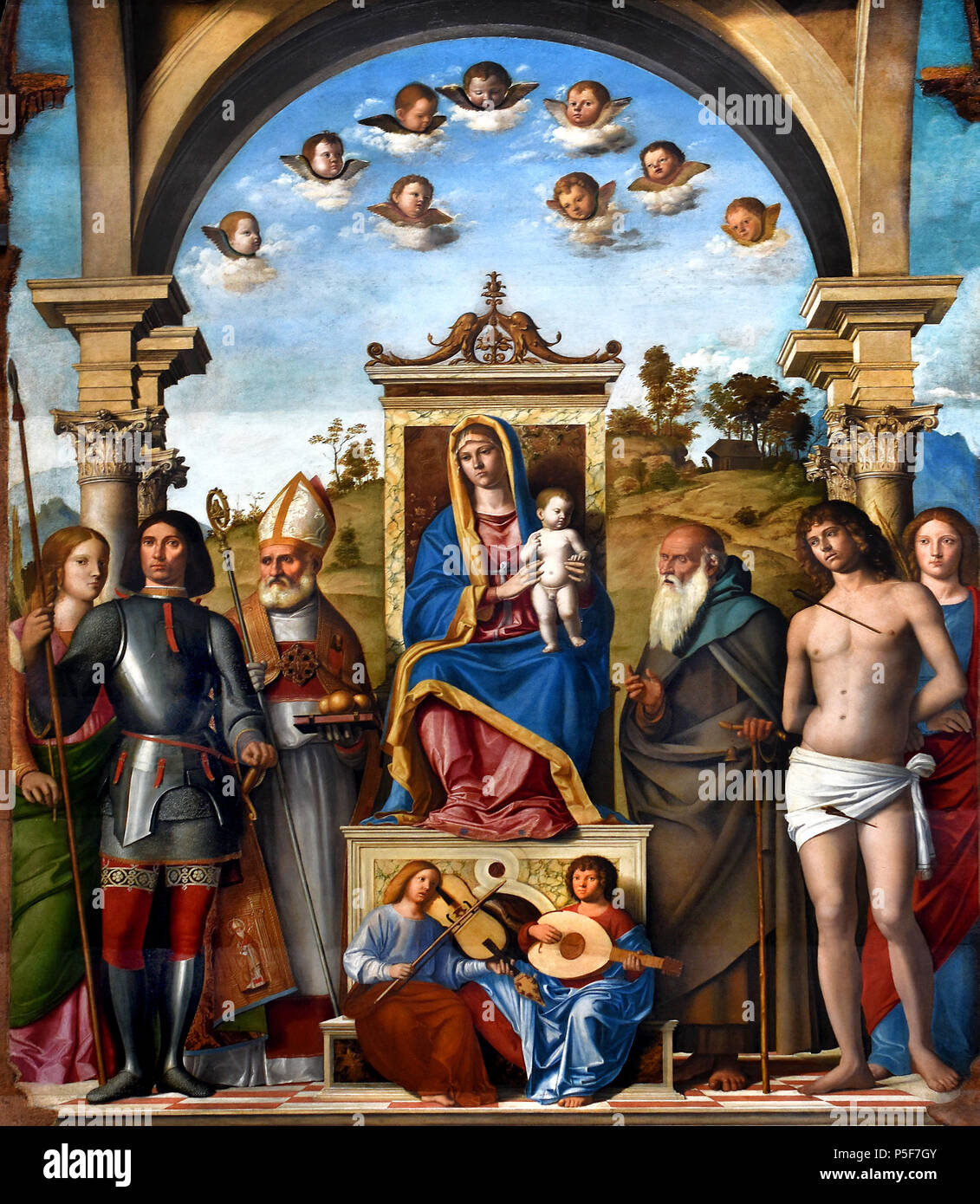 Madonna mit Kind und Heiligen Caterina, Giorgio, Nicola, Antonio Abt, Sebastiano und Lucia (Pala Dragan) von GIAMBATTISTA Cima da Conegliano 1459 - 1517 Italien, Italienisch thront. Stockfoto