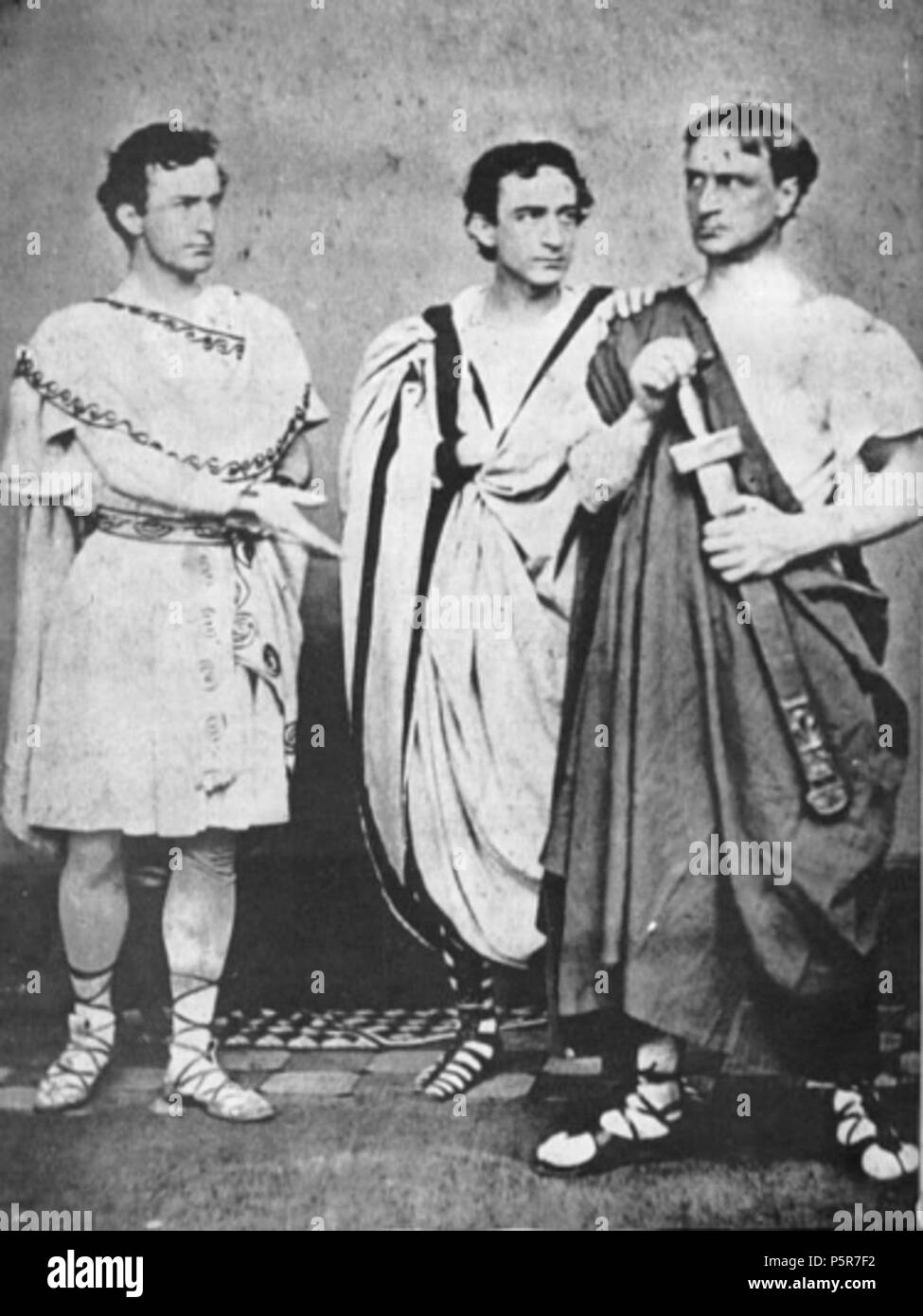N/A. John Wilkes Booth, Edwin Booth und Junius Booth, Jr. (von links nach rechts) in Shakespeares Julius Caesar im Jahr 1864. 1864 [1] berücksichtigt. Unbekannt 224 Stände Caesar Stockfoto