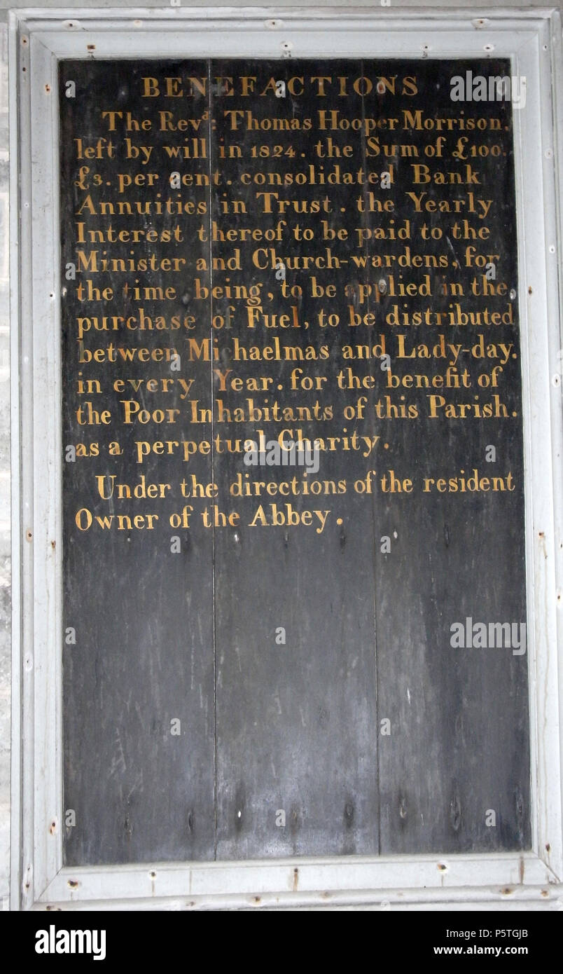 N/A. Englisch: Eingeschrieben im Turm von St. nectan's Kirche, Hartland, Devon, öffentlich verkündet die Wohltat von Pfr. Thomas Böttcher Morrison (1768-1824), von Yeo Vale, Alwington Hartland, Devon, die Abtei von seinem Onkel Paul II Obstgarten (1739-1812), dessen Wohltaten ähnlich auf einem angrenzenden Board aufgenommen werden vererbt. Bezeichnet: 'Wohltaten. Pfr. Thomas Böttcher Morrison links von wird im Jahr 1824 die Summe von £ 100 £ 3 Prozent. Konsolidierte Bank Annuitäten in Vertrauen, die jährlichen Zinsen davon auf die Minister und Church-Wardens für die Zeit, in der der Kauf von angewendet werden bezahlt werden Stockfoto