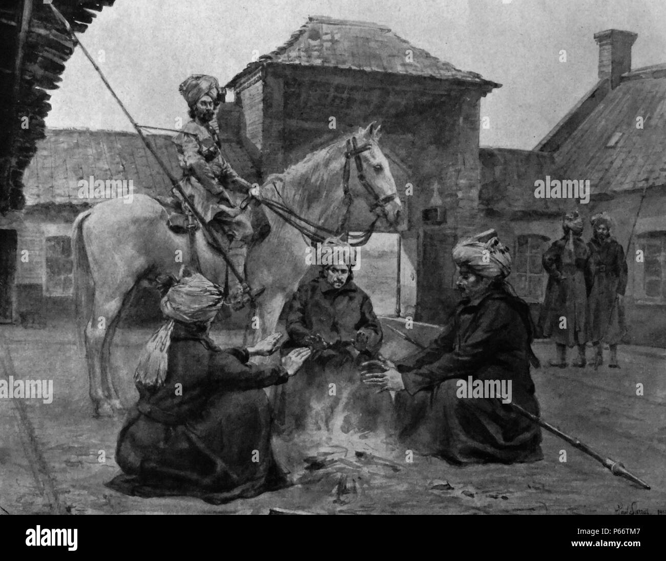 Indische Lancers (Imperiale Armee von Indien), Rest bei einem Brand auf einem Bauernhof in Nordfrankreich während ihrer Vorauszahlung auf die Schlacht vor. November 1914 Stockfoto