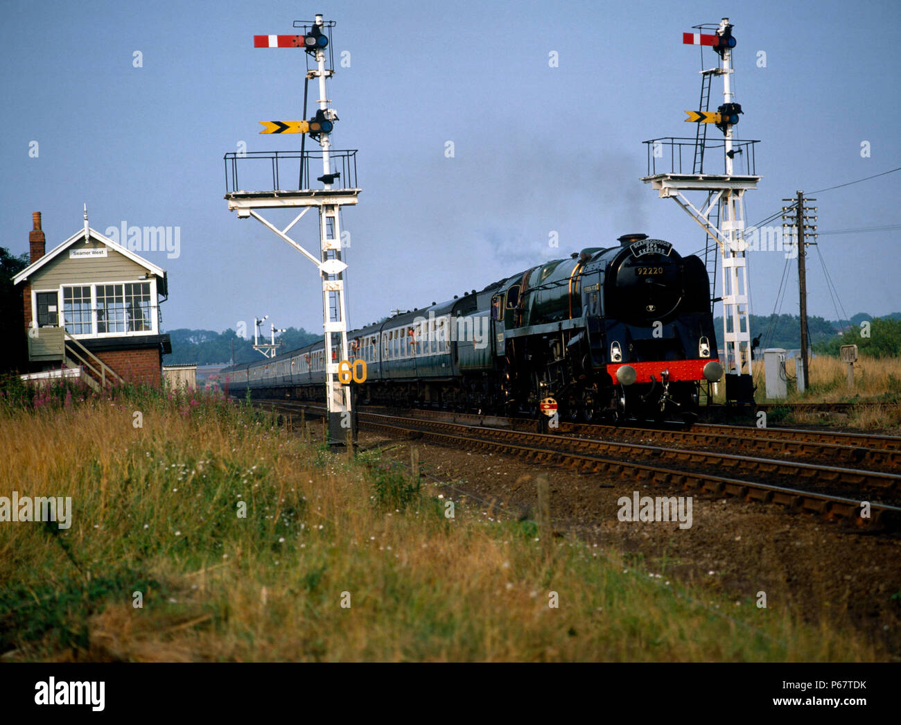 Scarborough Spa Express. Nr. 92220 'Evening Star' an Seamer Kreuzung auf dem Weg von Scarborough nach York. 11. August 1983. Stockfoto