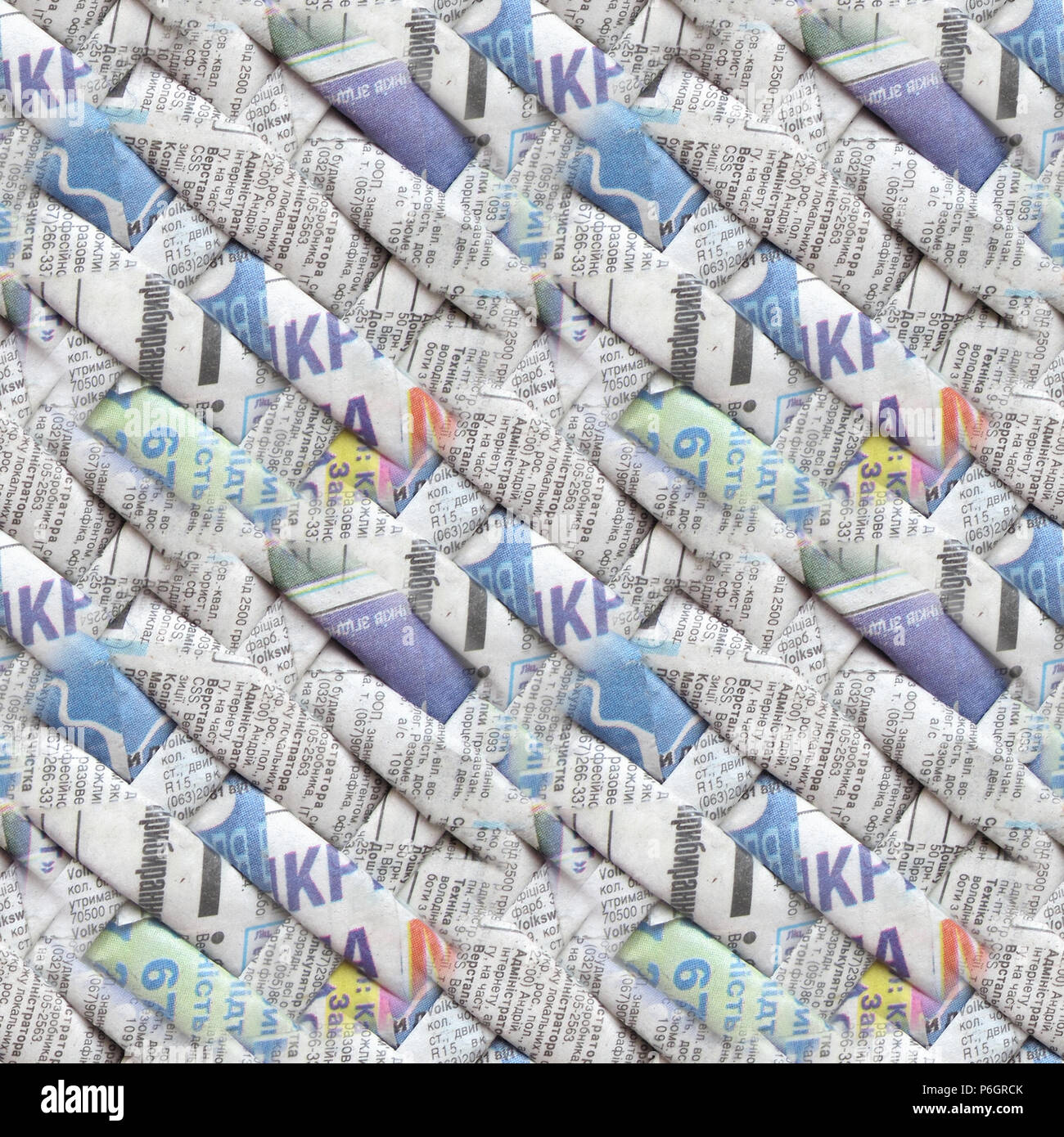 Ziemlich cool nahtlose Muster, erzeugt auf der Basis von Twisted weben Zeitungen. Abstrakte nahtlosen strukturierten Hintergrund mit kyrillischen Buchstaben. Stockfoto