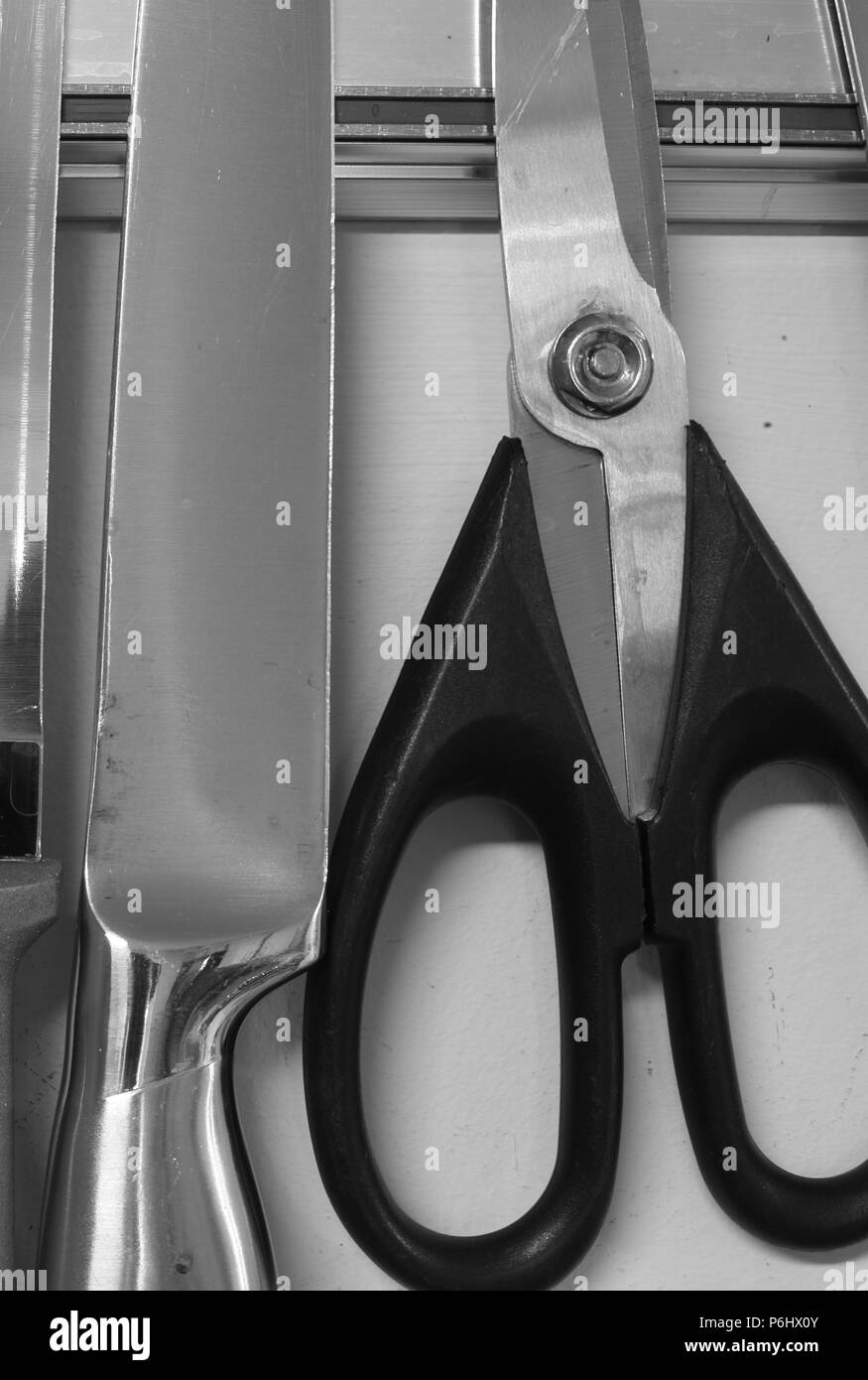 Küche Besteck an die Wand hängen Stockfoto