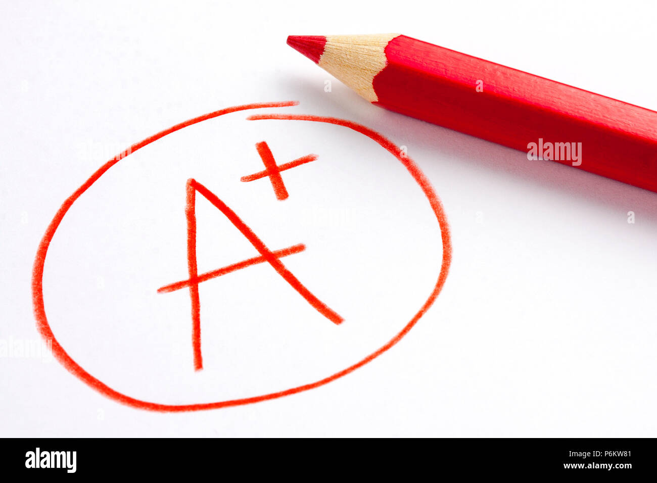 Roter Stift und ein Plus Grad Markierung Stockfoto