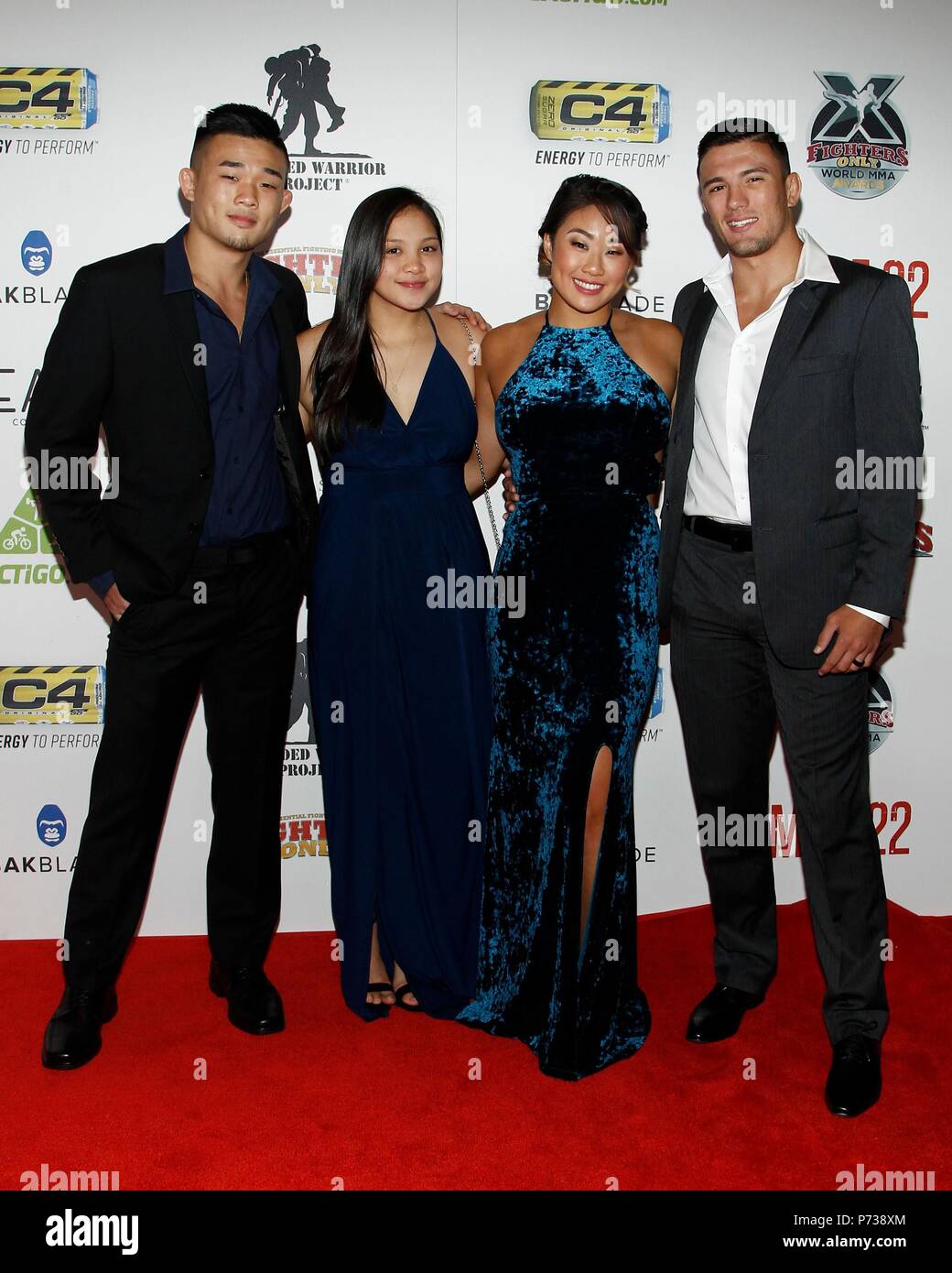 Las Vegas, NV, USA. 3. Juli 2018. Christian Lee, Katie Guzman, Angela Lee, Bruno Pucci in der Ankunftshalle für nur 10. jährlichen Kämpfer Welt Mixed Martial Arts MMA Awards - Teil 2, Palms Casino Resort, Las Vegas, NV Juli 3, 2018. Credit: JA/Everett Collection/Alamy leben Nachrichten Stockfoto
