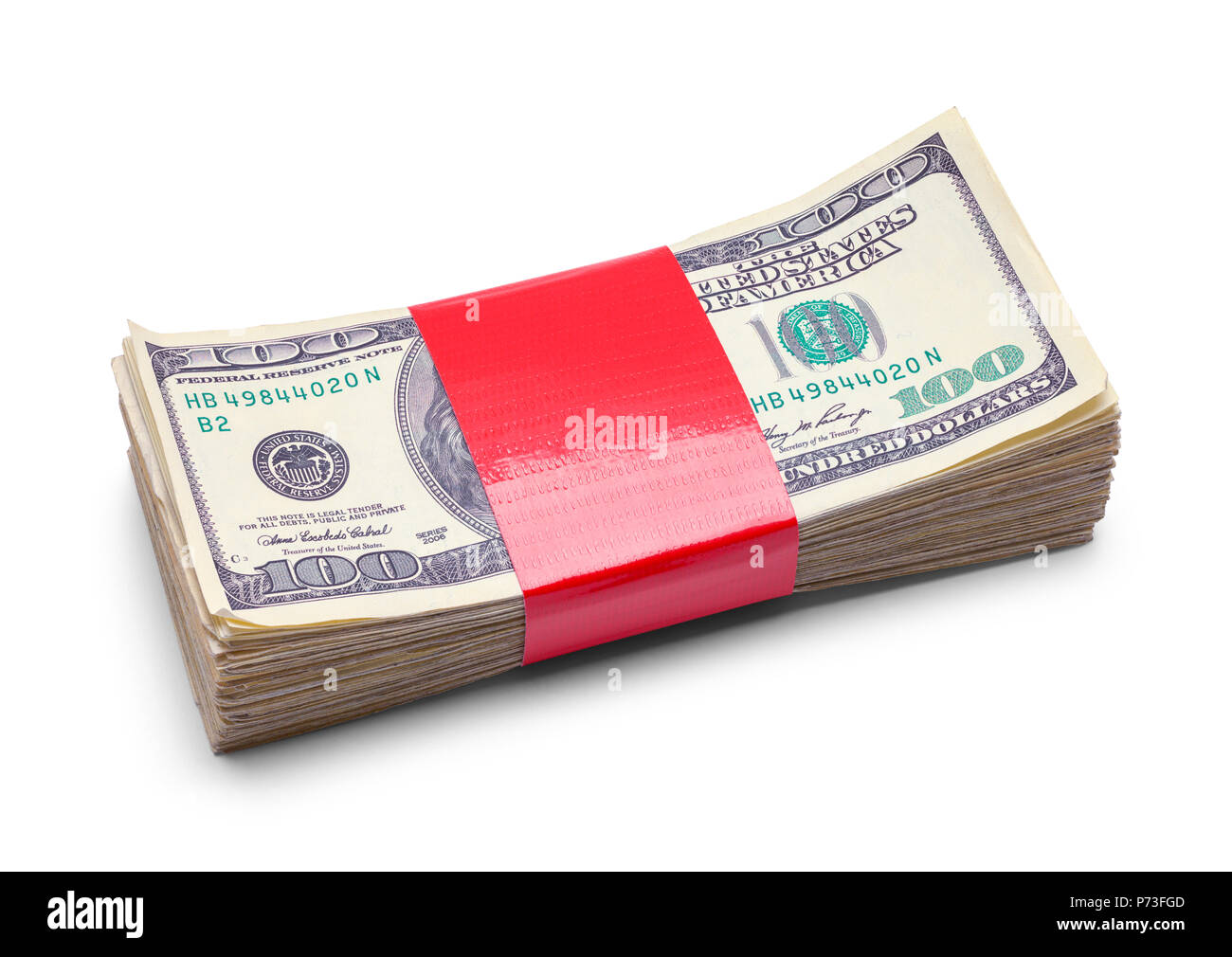 Stapel Geld mit rotem Klebeband isoliert auf weißem Hintergrund. Stockfoto