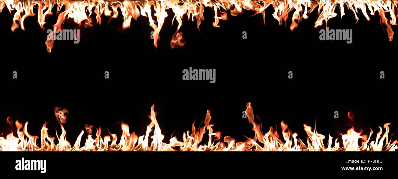 Horizontale Flamme Grenze auf schwarzem Hintergrund. Weite Einstellung. Stockfoto