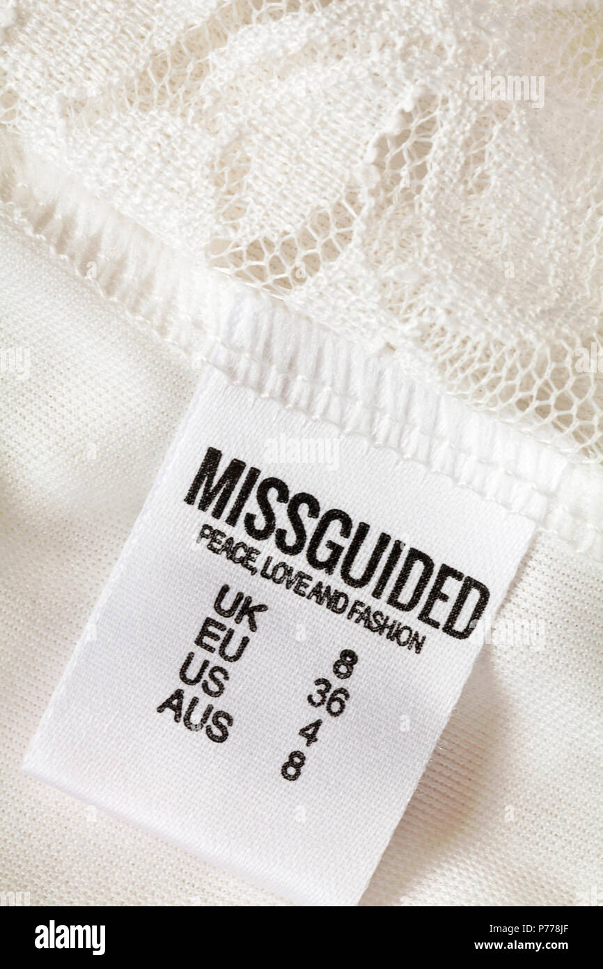 Missguided Frieden Liebe und Mode Label in der Frau Kleidung UK Größe 8  Stockfotografie - Alamy