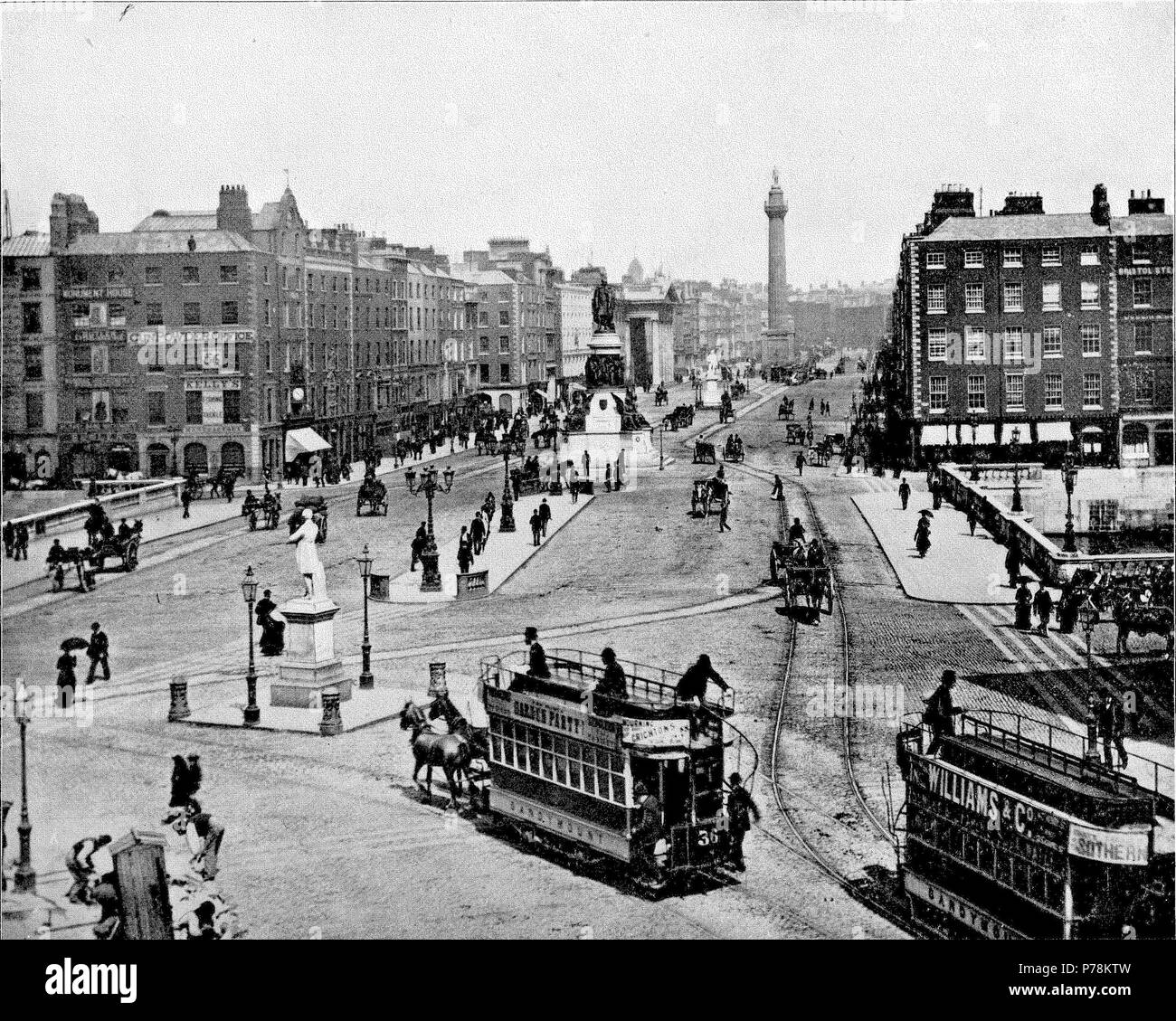 Englisch: O'Connell Bridge und die O'Connell Street, Dublin, Irland, von John L. Stoddard (d. 1931), Nelson Säule und, mit denen er konfrontiert, das General Post Office. ca. 1900 12 O'Connell Street ca. 1900 Stockfoto