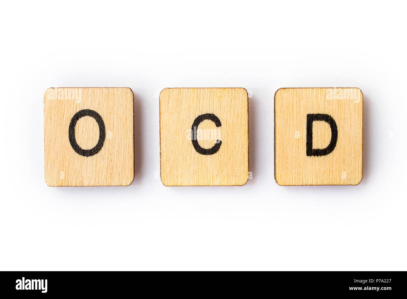 Die Abkürzung OCD - Zwangsstörungen - Dinkel, mit hölzernen Buchstabensteine. Stockfoto