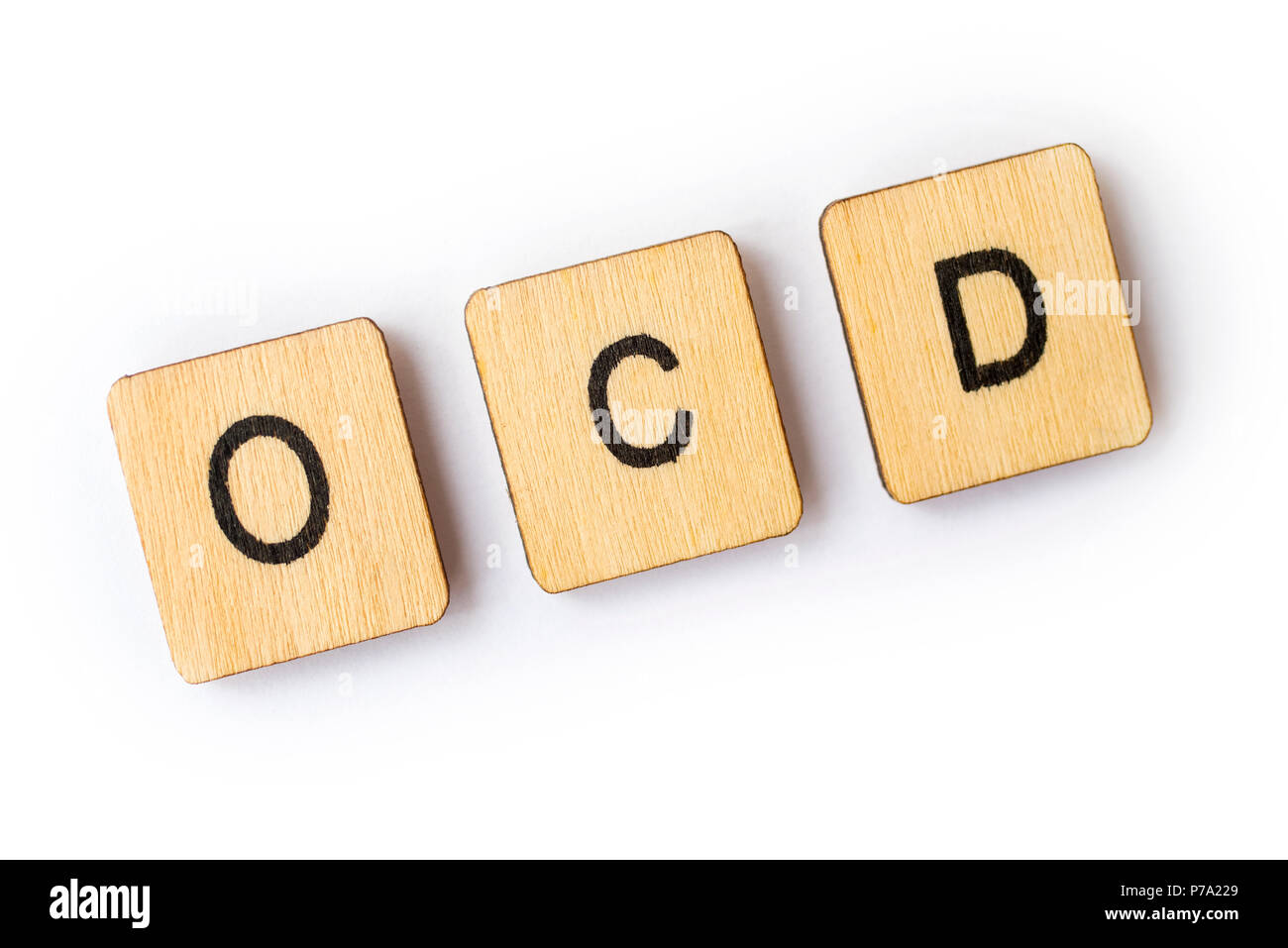 Die Abkürzung OCD - Zwangsstörungen - Dinkel, mit hölzernen Buchstabensteine. Stockfoto