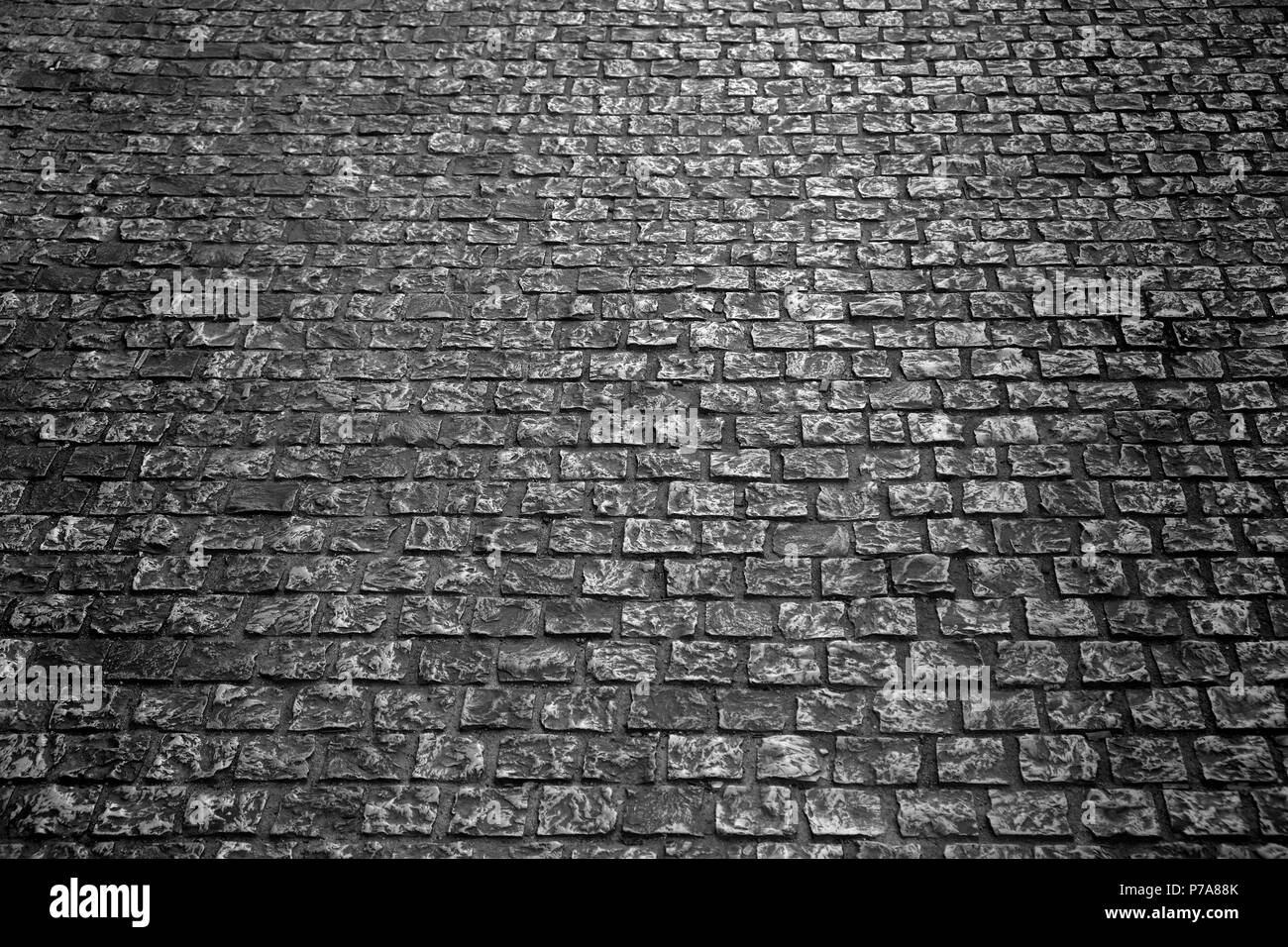 Alte Straße mit Kopfsteinpflaster Hintergrund Textur Stockfoto