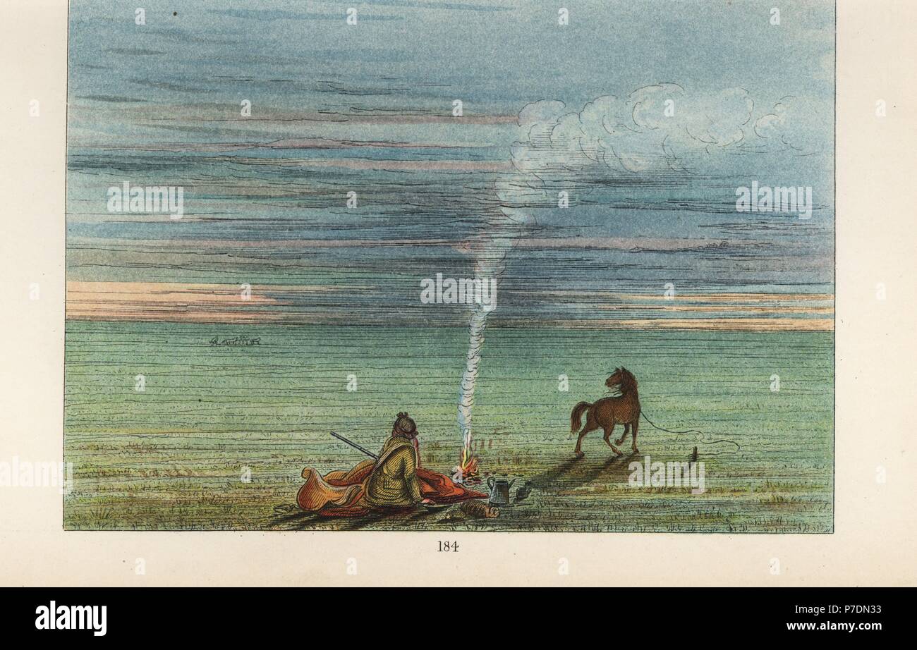 George Catlin lagerten in der Nacht in der Prärie Illinois mit seinem Wildpferd Comanche Charley. Handkoloriert Lithographie von George Catlins Sitten, Bräuche und Zustand der nordamerikanischen Indianer, London, 1841. Stockfoto