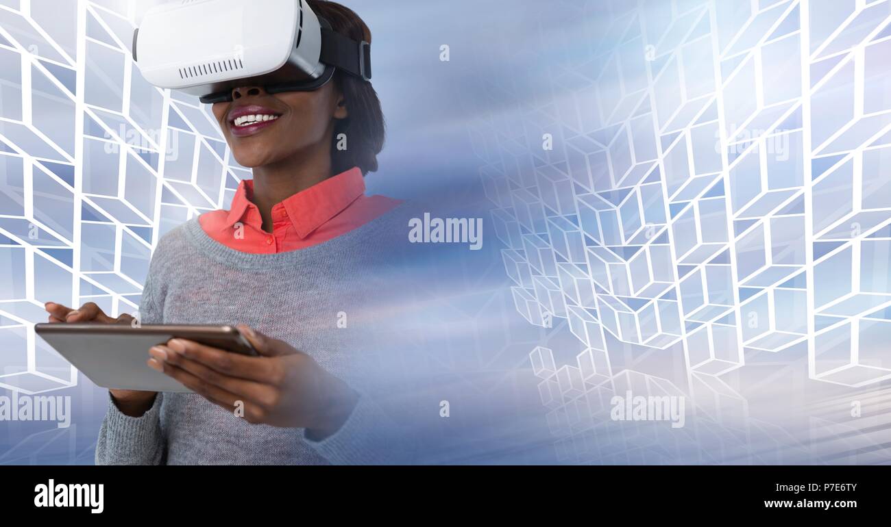 Frau mit Virtual reality Headset mit Tablet mit geometrischen Übergang Stockfoto
