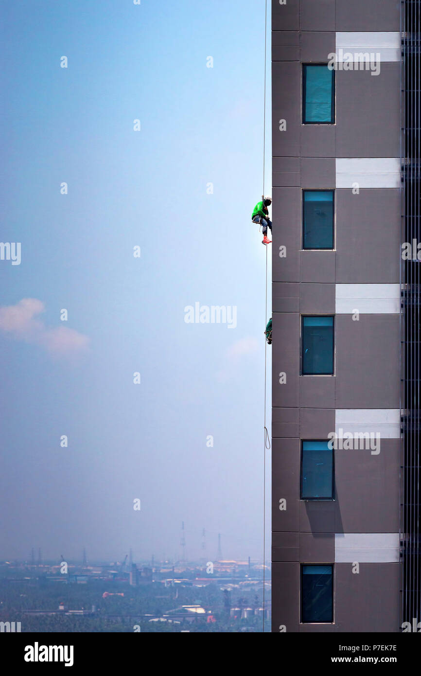 Bauarbeiter arbeiten an Hochhäusern in Bangkok, Thailand Stockfoto
