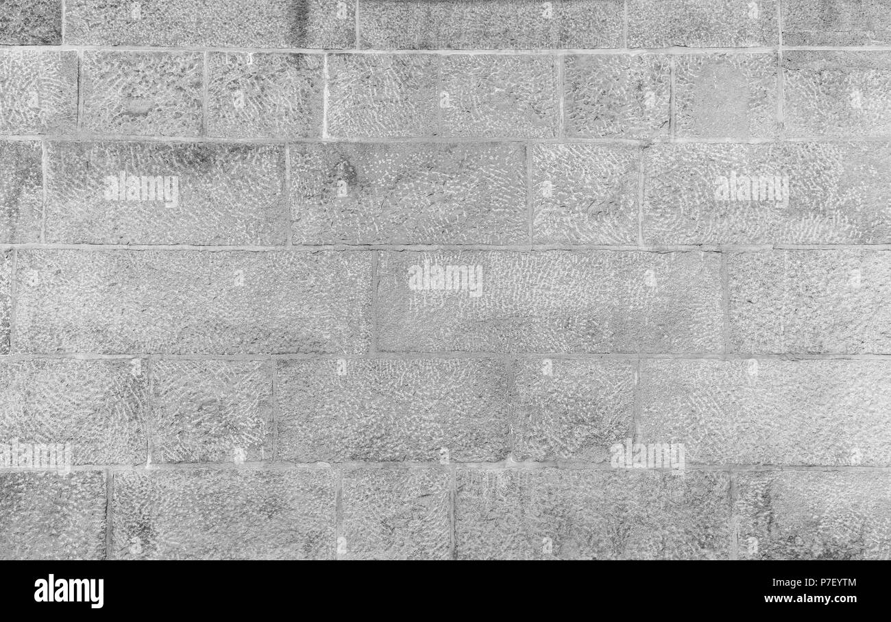 Full Frame Hintergrund eines alten und gealterte Wand aus Steinen in Schwarz und Weiß Stockfoto Full Frame Hintergrund eines alten und gealterte Wand aus Steinen in Schwarz und Weiß Stockfoto
