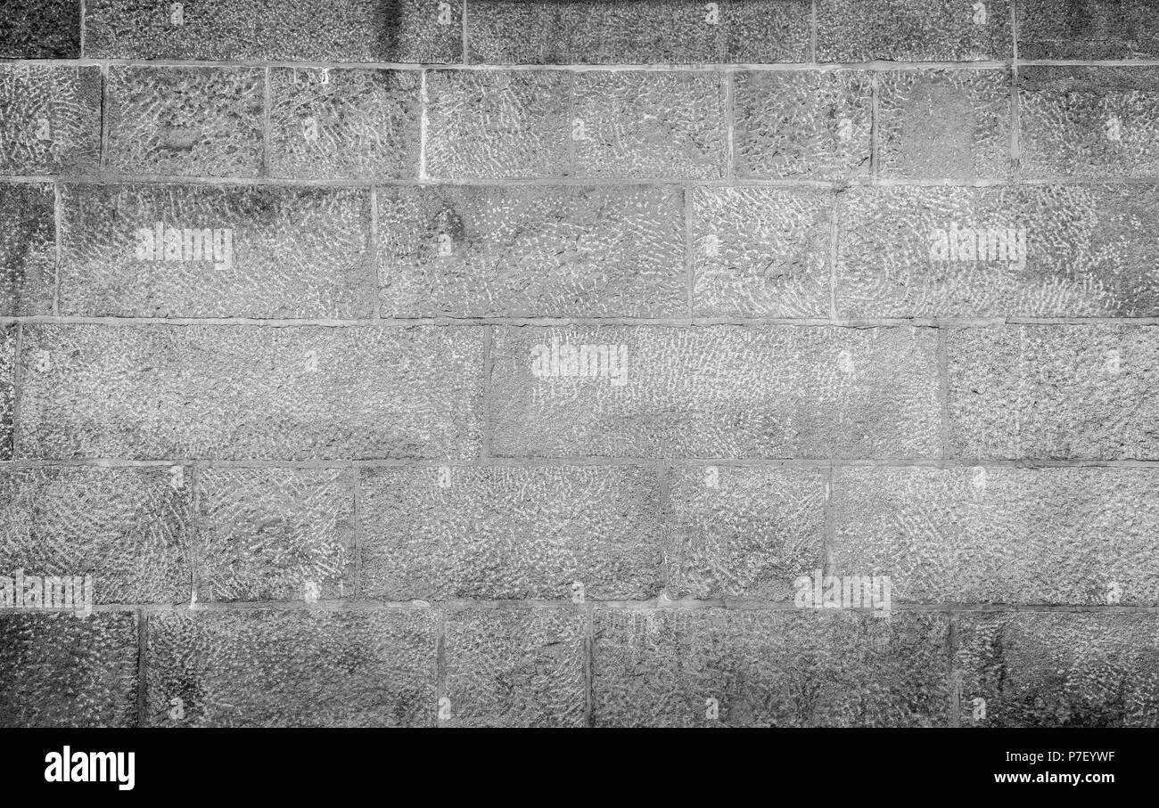 Full Frame Hintergrund eines alten und gealterte Wand aus Steinen in Schwarz und Weiß mit Vignette Stockfoto Full Frame Hintergrund eines alten und gealterte Wand aus Steinen in Schwarz und Weiß mit Vignette Stockfoto