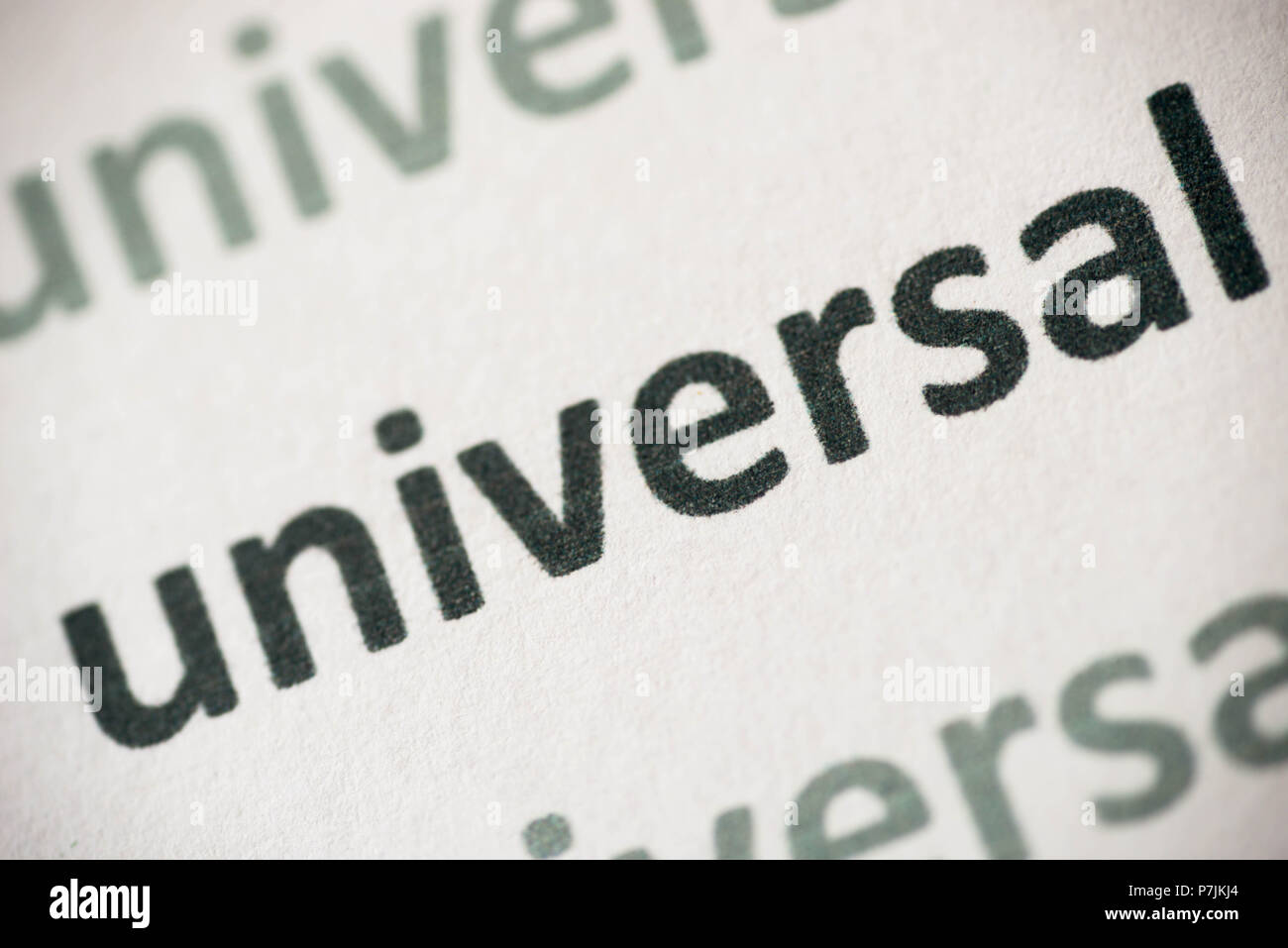 Wort universal Makro auf weißem Papier gedruckt Stockfoto
