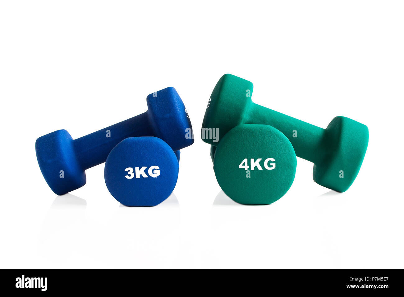 Blau und grün Fitnessstudio Hanteln auf einem weißen Hintergrund. Stockfoto