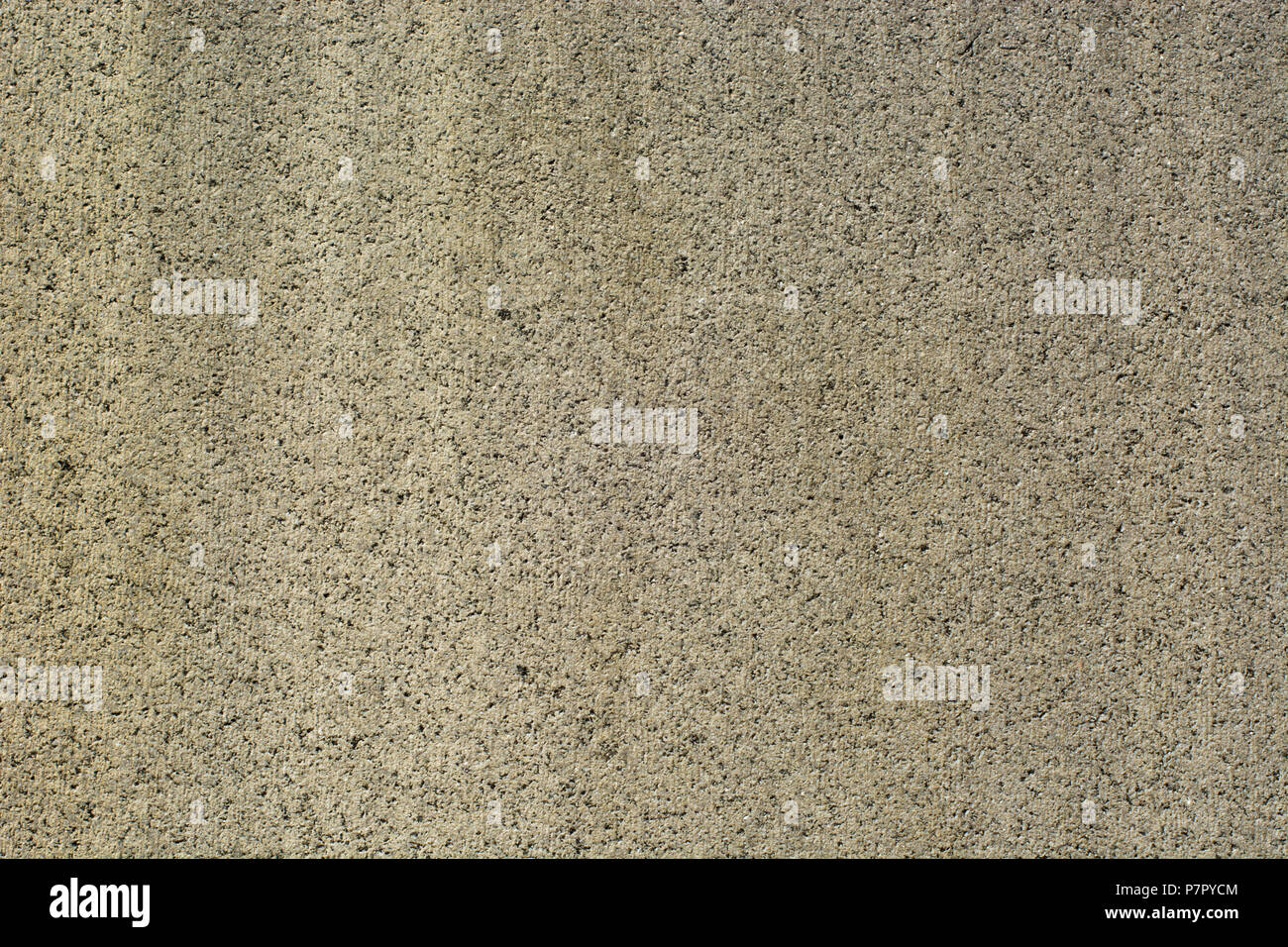 Glatte Oberfläche sogar Stein. Grau mit Granulat in einer dunkleren Farbe Stockfoto
