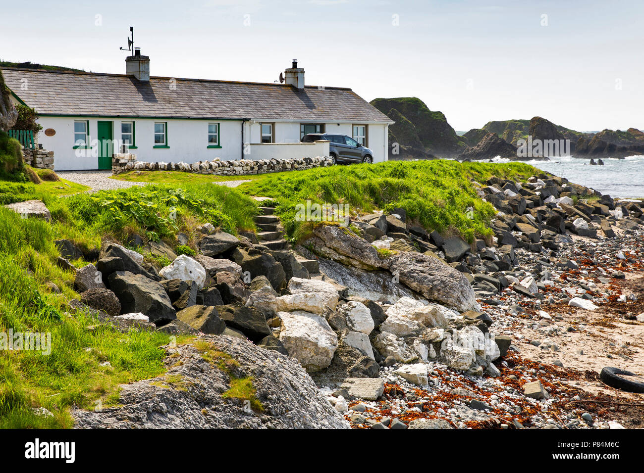 Großbritannien, Nordirland, Co Antrim, ballintoy Hafen, direkt am Meer, Ferienhäuser der alte Fischer Stockfoto