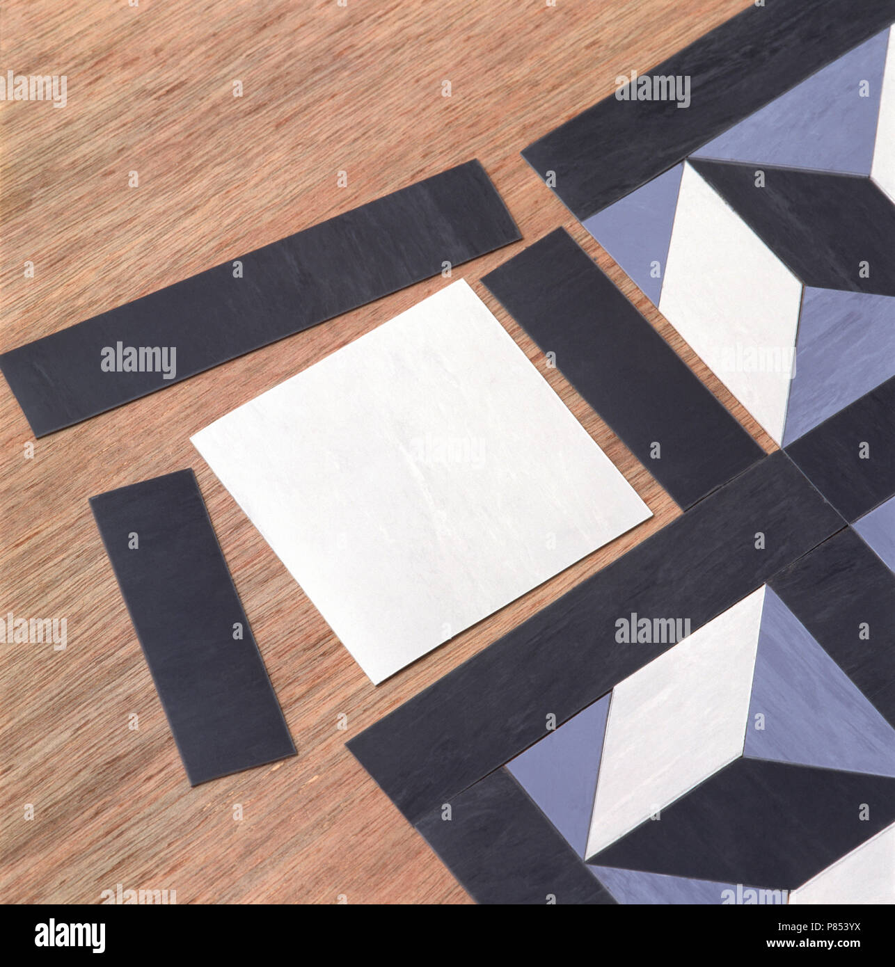 Close-up bemalt geometrisch Stücke eine bemalte Fußmatte zu machen Stockfoto