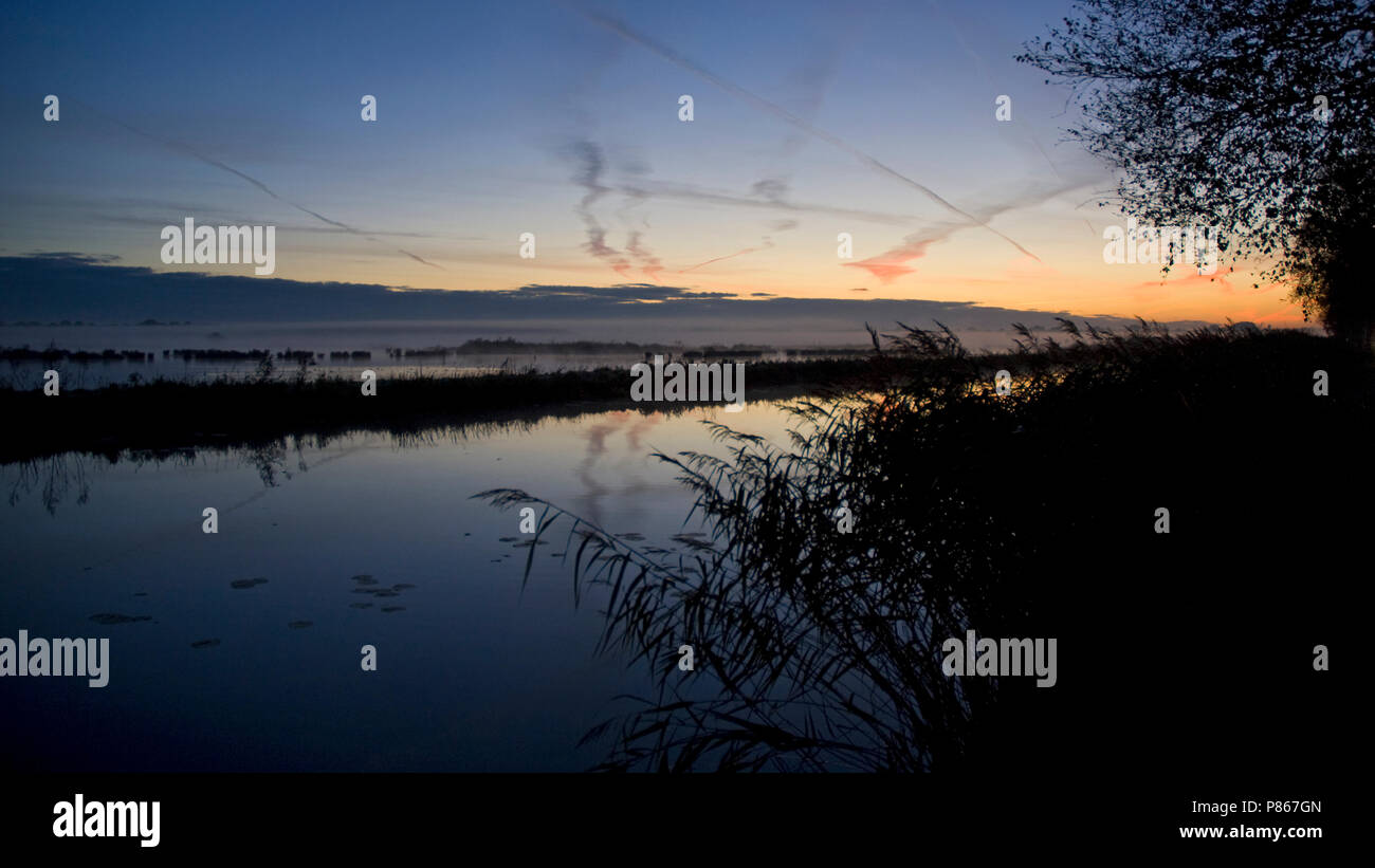 Zonsopkomst boven de Bovenmeent Naarden Nederland, Sonnenaufgang am Bovenmeent Naarden Niederlande Stockfoto