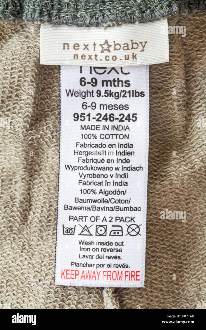 Label in weiter Baby Kleidung in Indien 100% Baumwolle - Fernhalten von Feuer Stockfoto