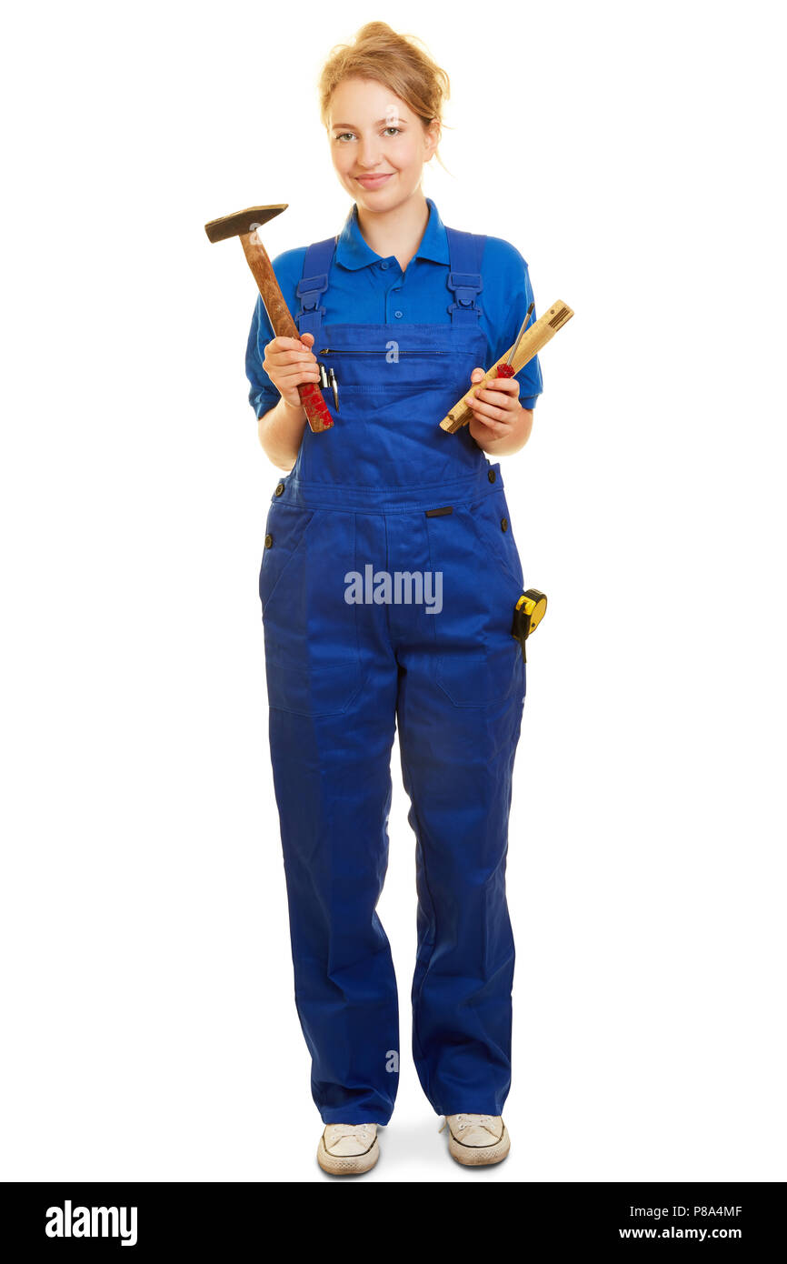 Junge Frau im blauen Anzug als Handwerker oder Heimwerker mit Werkzeug Stockfoto