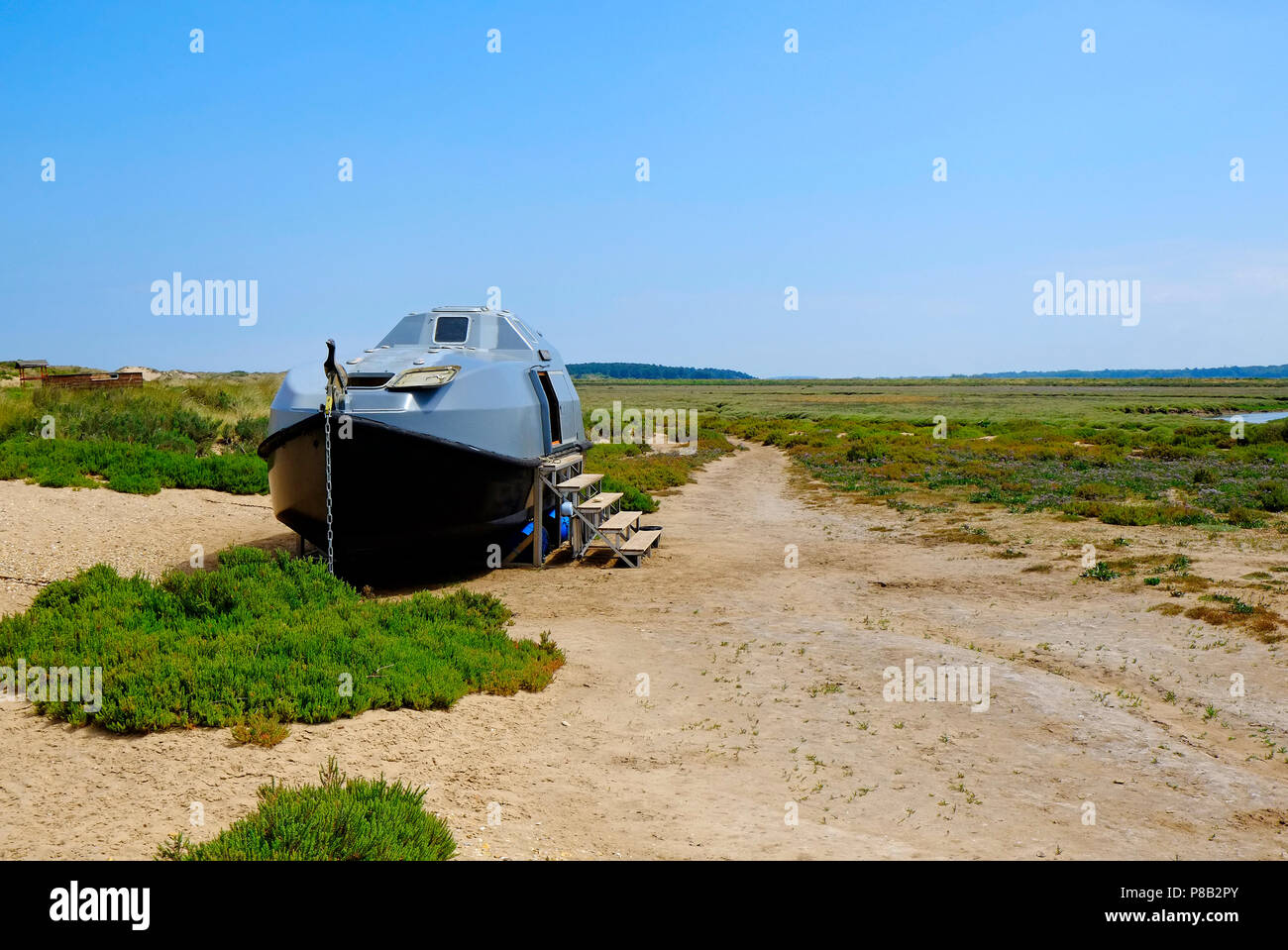 Alte Rettungsboot coastal Retreat umgewandelt, Burnham Overy staithe, North Norfolk, England Stockfoto