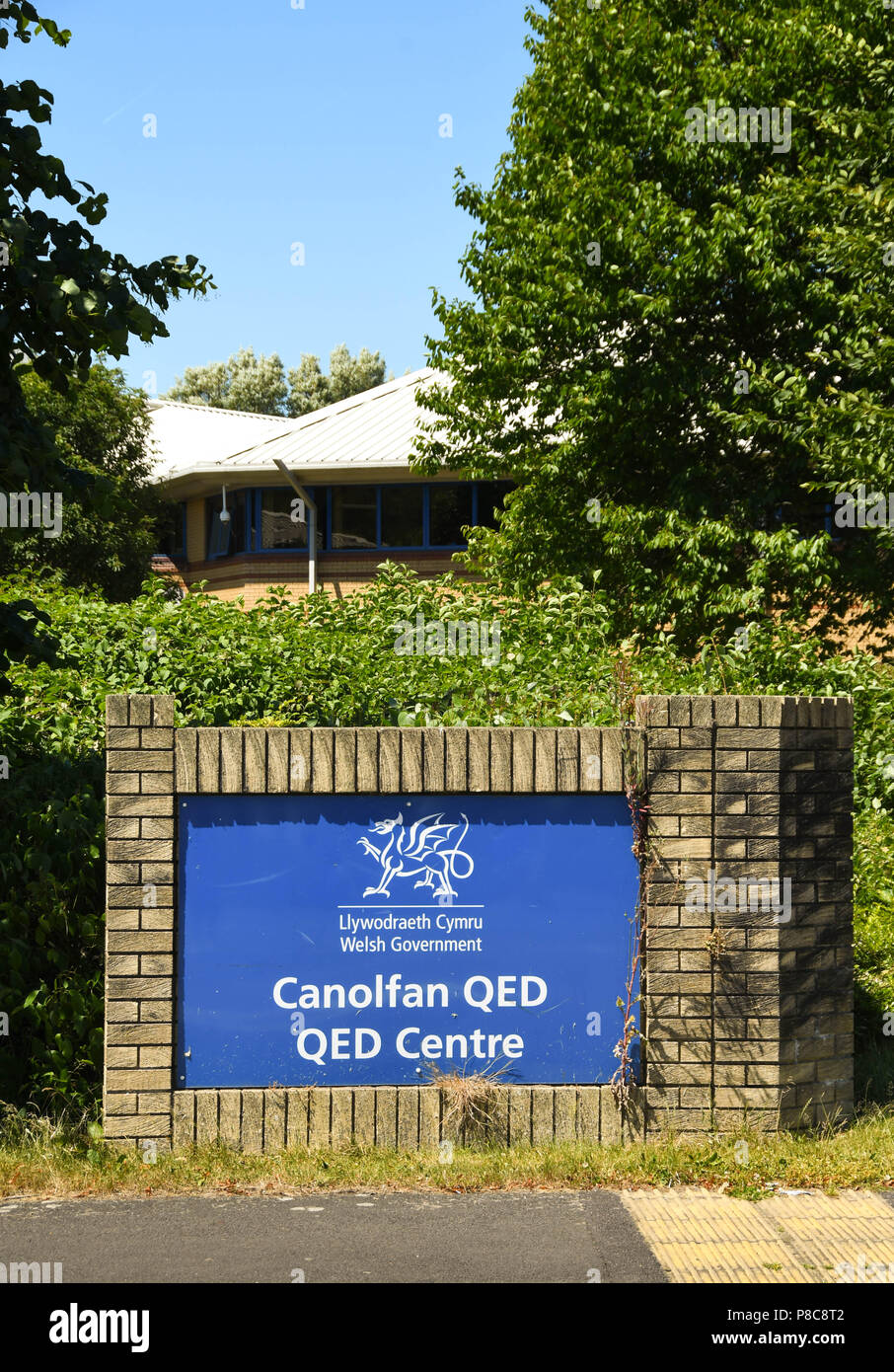 Signoutside der walisischen Regierung Büros an der QED-Center auf Treforest Industrial Estate in South Wales Stockfoto