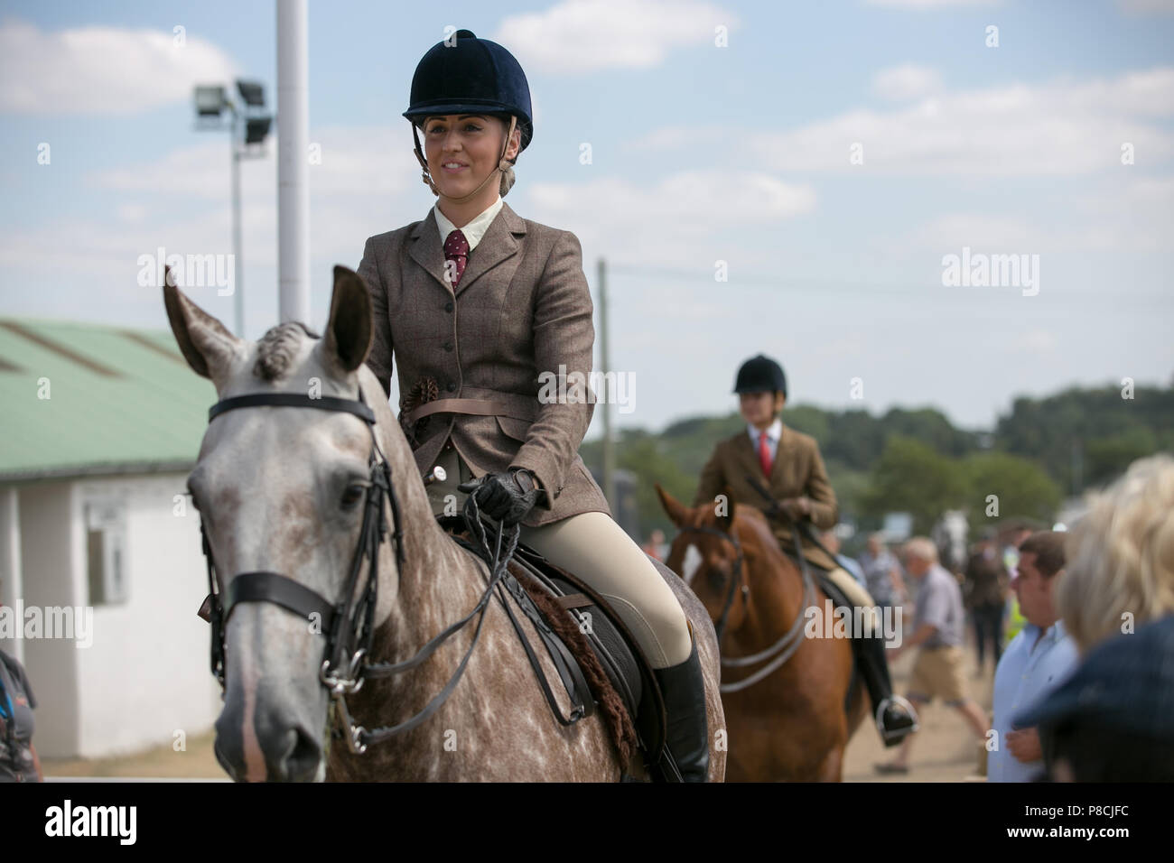 Harrogate, Großbritannien. 10. Juli 2018. Die Teilnehmer während des Großen Yorkshire Tag zeigen 2018 gesehen. Die großen YORKSHIRE zeigen Juli, 2018 Die Große Yorkshire Show ist eine legendäre dreitägige Veranstaltung und eine der größten landwirtschaftlichen Veranstaltungen in der englischen Kalender. Jedes Jahr werden mehr als 130.000 Besucher und über 8.500 Tiere laufen auf der großen Yorkshire Showground in Harrogate zu konkurrieren, Kontakte knüpfen und Feiern. Credit: Rahman Hassani/Alamy leben Nachrichten Stockfoto