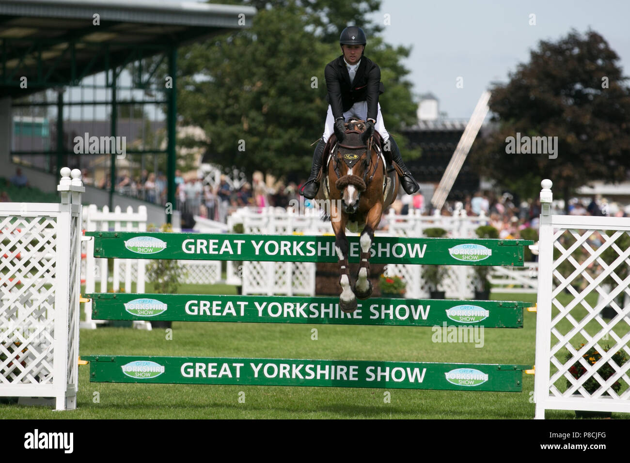 Harrogate, Großbritannien. 10. Juli 2018. Die Teilnehmer während des Großen Yorkshire Tag zeigen 2018 gesehen. Die großen YORKSHIRE zeigen Juli, 2018 Die Große Yorkshire Show ist eine legendäre dreitägige Veranstaltung und eine der größten landwirtschaftlichen Veranstaltungen in der englischen Kalender. Jedes Jahr werden mehr als 130.000 Besucher und über 8.500 Tiere laufen auf der großen Yorkshire Showground in Harrogate zu konkurrieren, Kontakte knüpfen und Feiern. Credit: Rahman Hassani/Alamy leben Nachrichten Stockfoto
