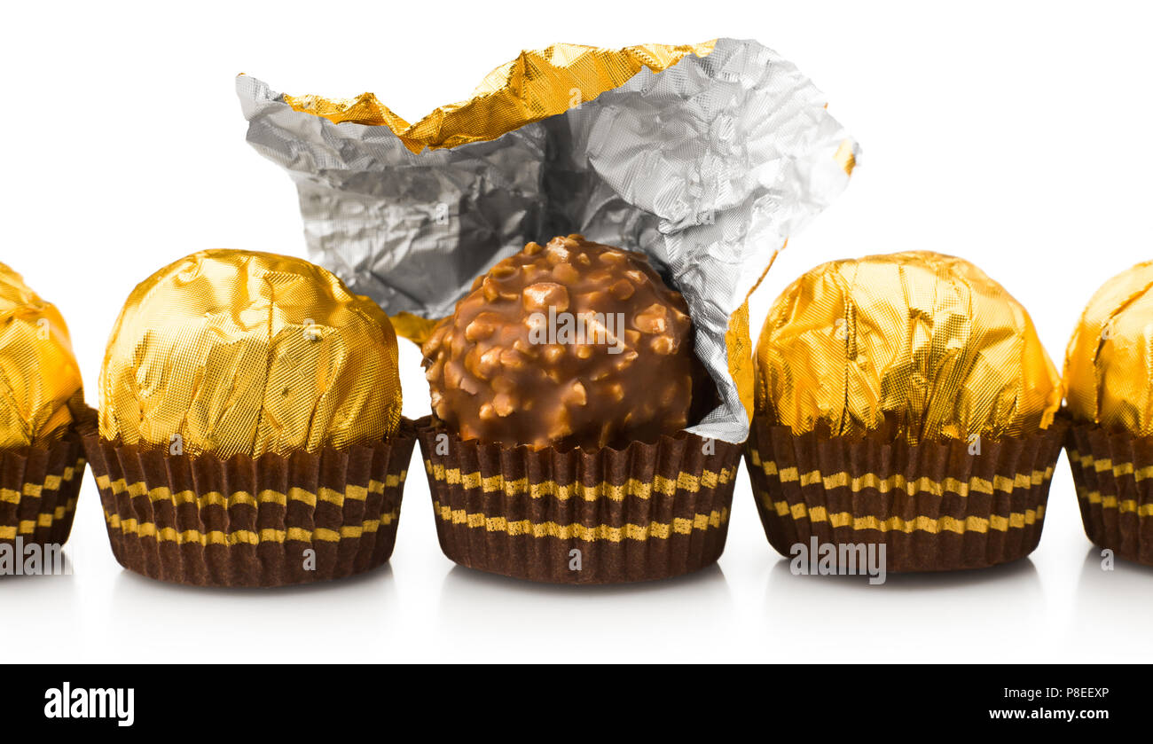 Candy Wrapper in Gold, auf weißem Hintergrund Stockfoto