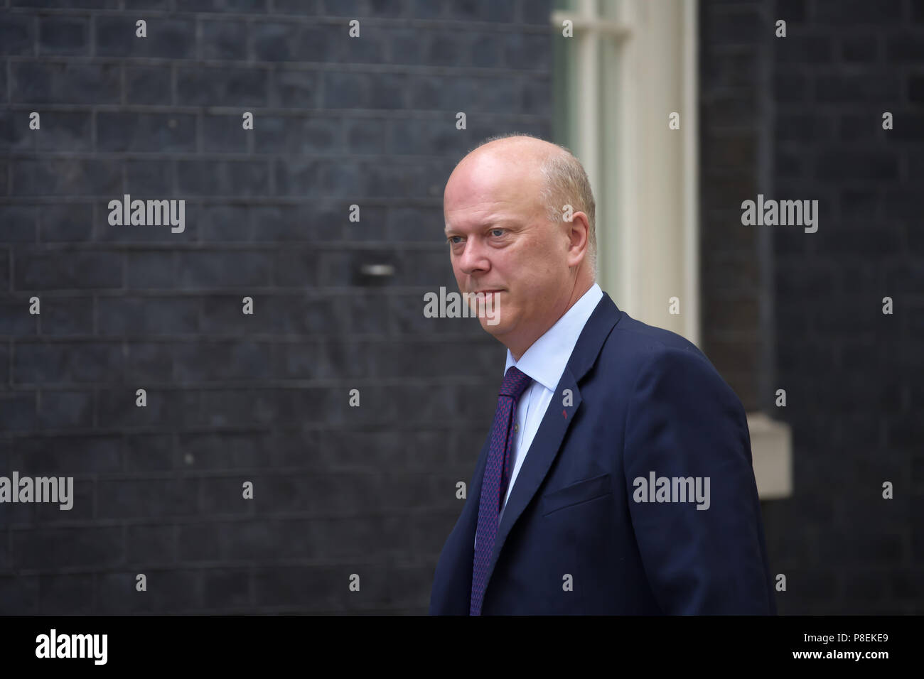 Der Staatssekretär für Verkehr Chris Grayling MP kommt für die wöchentliche Kabinettssitzung am 10 Downing Street in London. Stockfoto