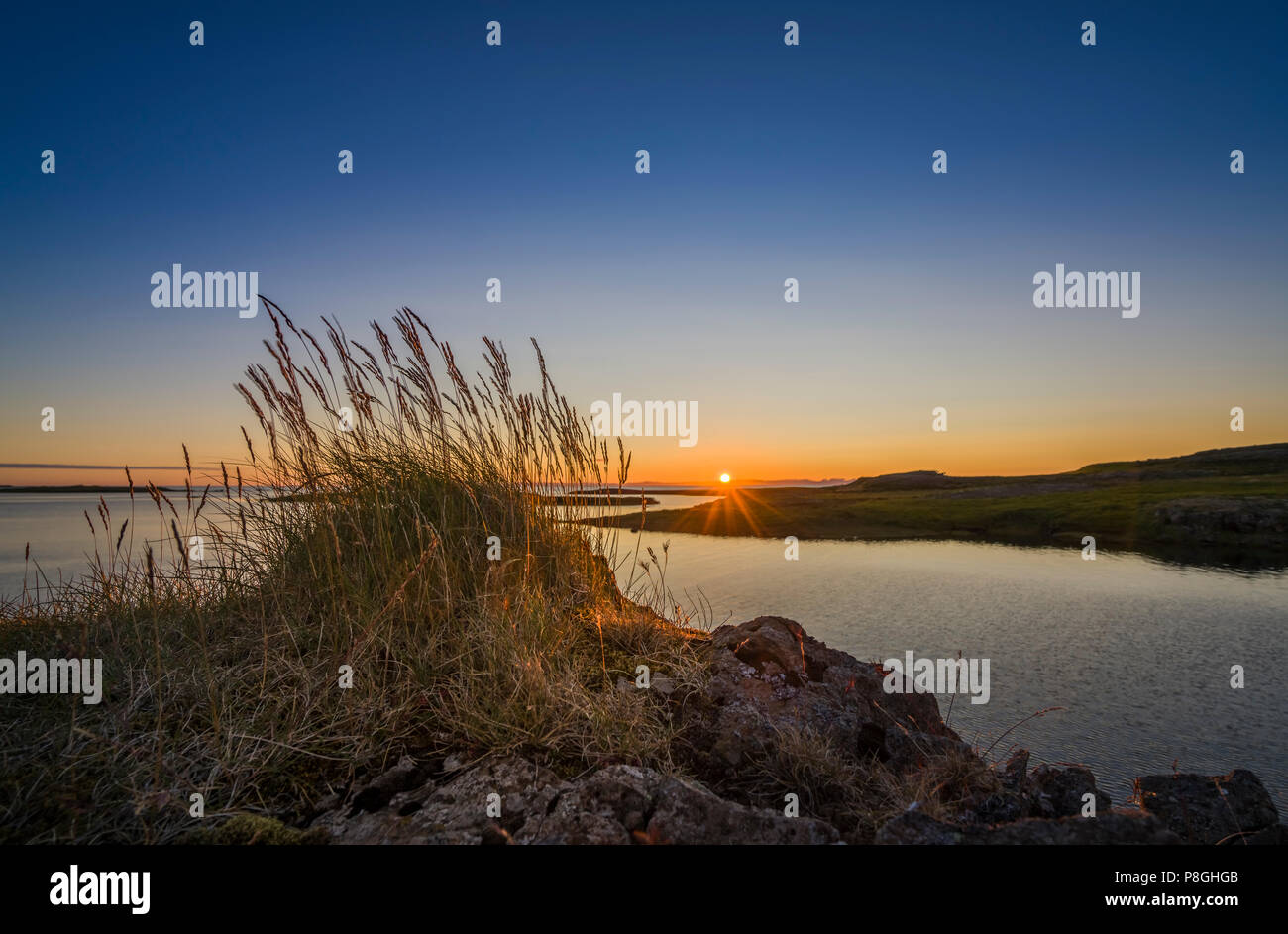 Sonnenuntergang, Fellsstrond, Breidafjördur, Western Island Stockfoto