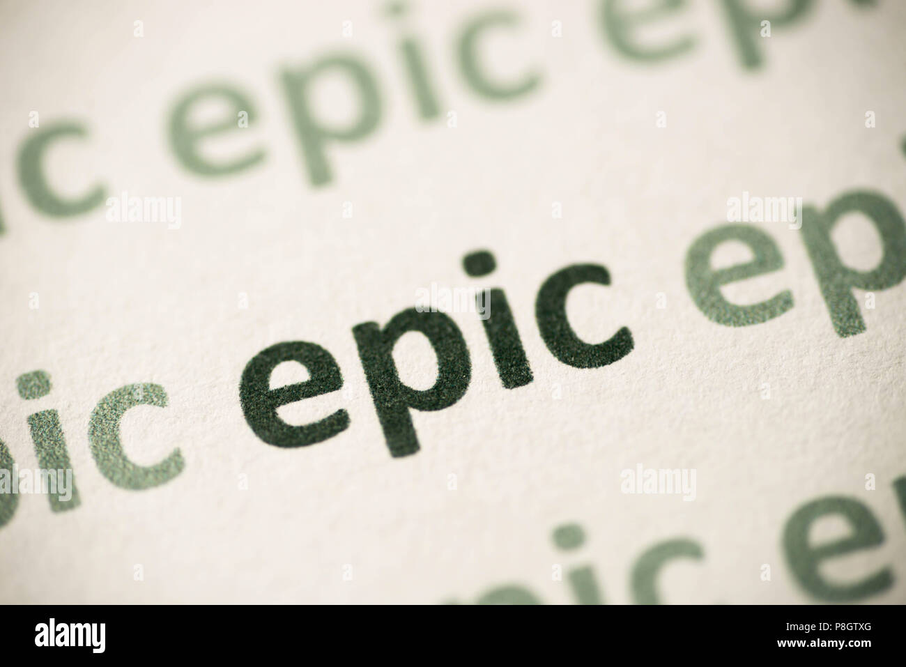 Wort epic auf weißem Papier Makro gedruckt Stockfoto