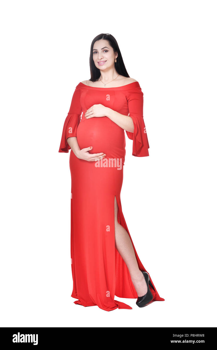 Schöne schwangere Frau in Kleid Stockfoto