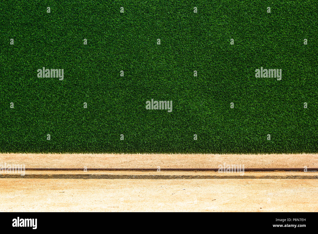 Grüne Gras wand Textur Hintergrund. Kunstrasen Wand mit Platz für Hintergrund oder text Design. Stockfoto