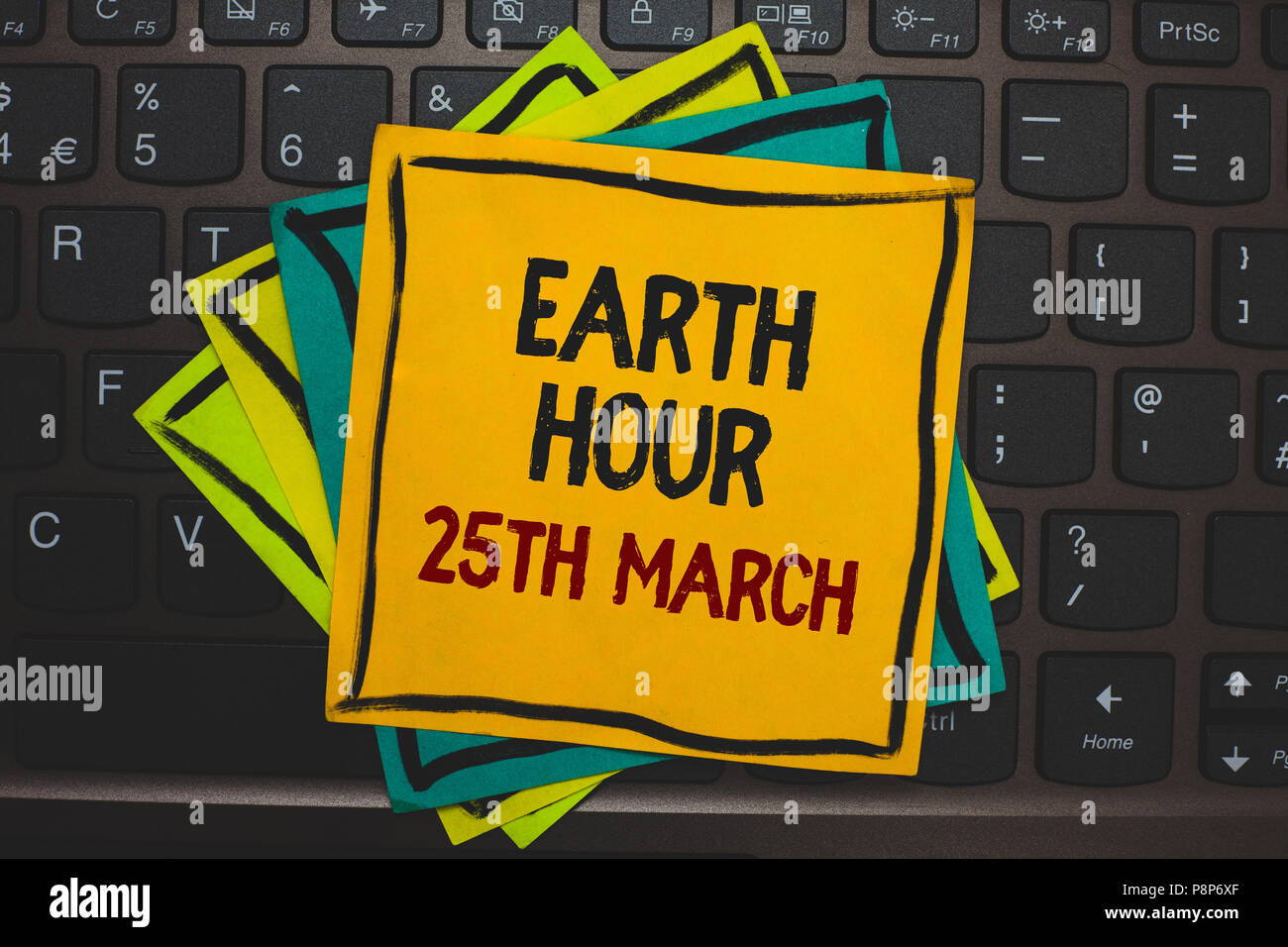 Wort schreiben Text Earth Hour am 25. März. Business Konzept für Symbol Engagement für Planet organisierte World Wide Fund mehrere Farbe klebrige Grenze Karte Stockfoto
