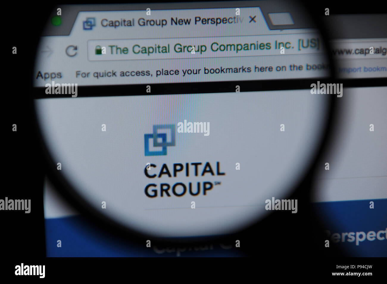 Der Capital Group Website durch ein Vergrößerungsglas gesehen Stockfoto