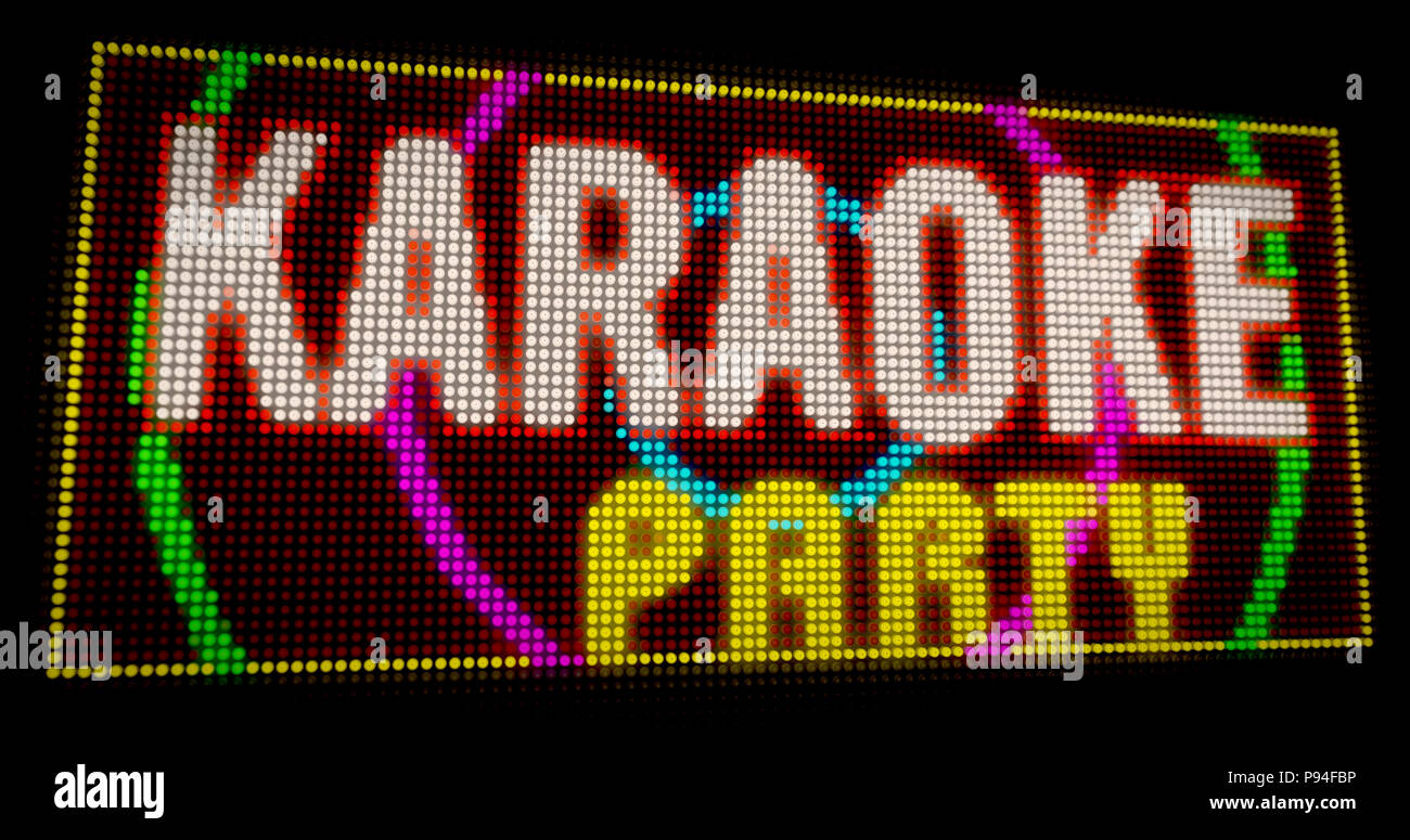 Karaoke Party zeichen Neon. Große beleuchtete Buchstaben gebaut von Glühlampen LED 3D Illustration. Stockfoto