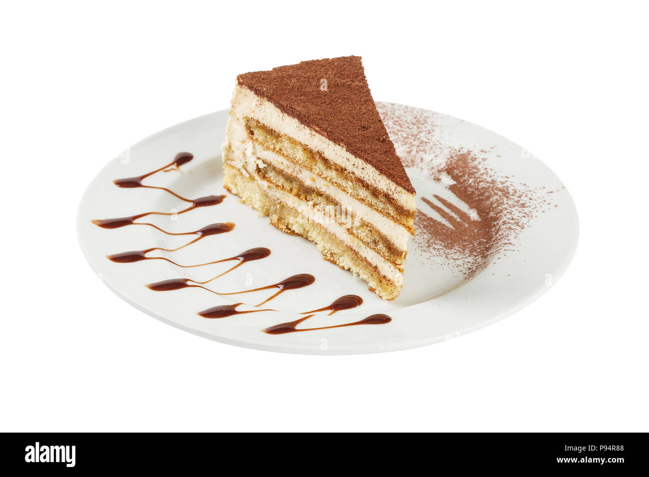 Schicht von tiramisu Kuchen auf weißem Hintergrund. Beschneidungspfad gehören Stockfoto