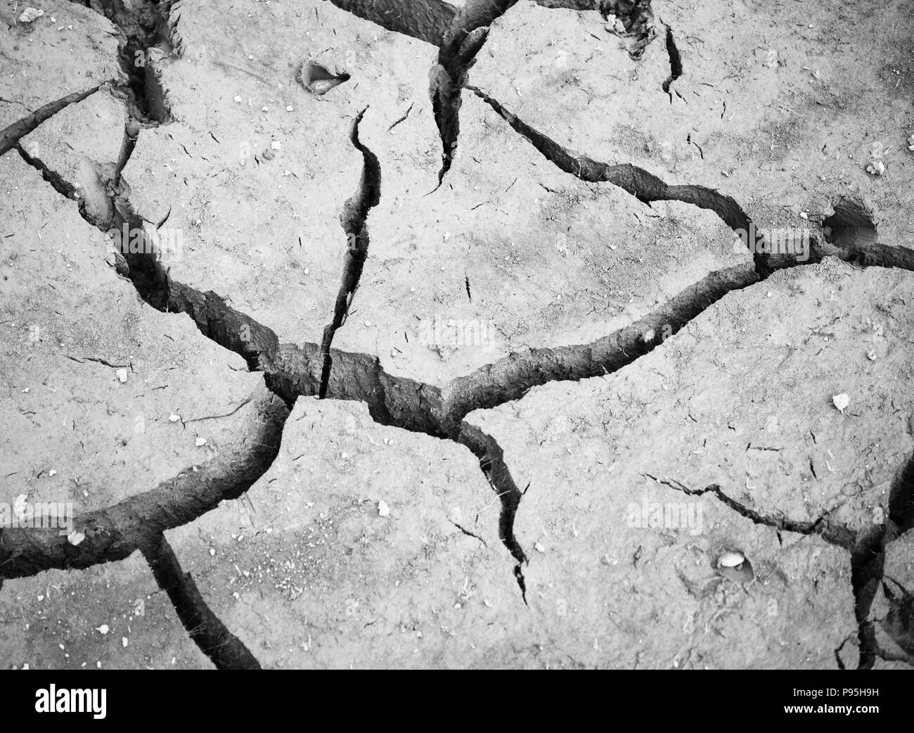 Trockenen Schmutz an der Unterseite der getrockneten Behälter Injebreck Insel Man Risse Stockfoto