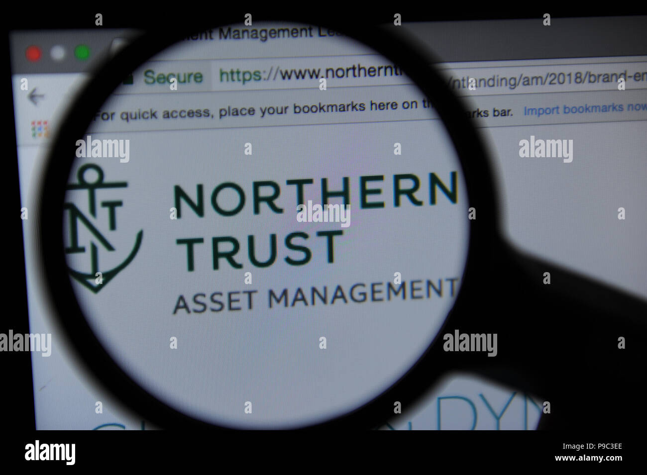 Die Northern Trust Website durch ein Vergrößerungsglas gesehen Stockfoto