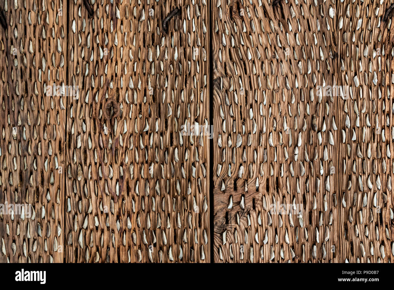 Strukturierten Hintergrund von Nizza Wand besteht aus perforiertem Schnittholz Platten Stockfoto