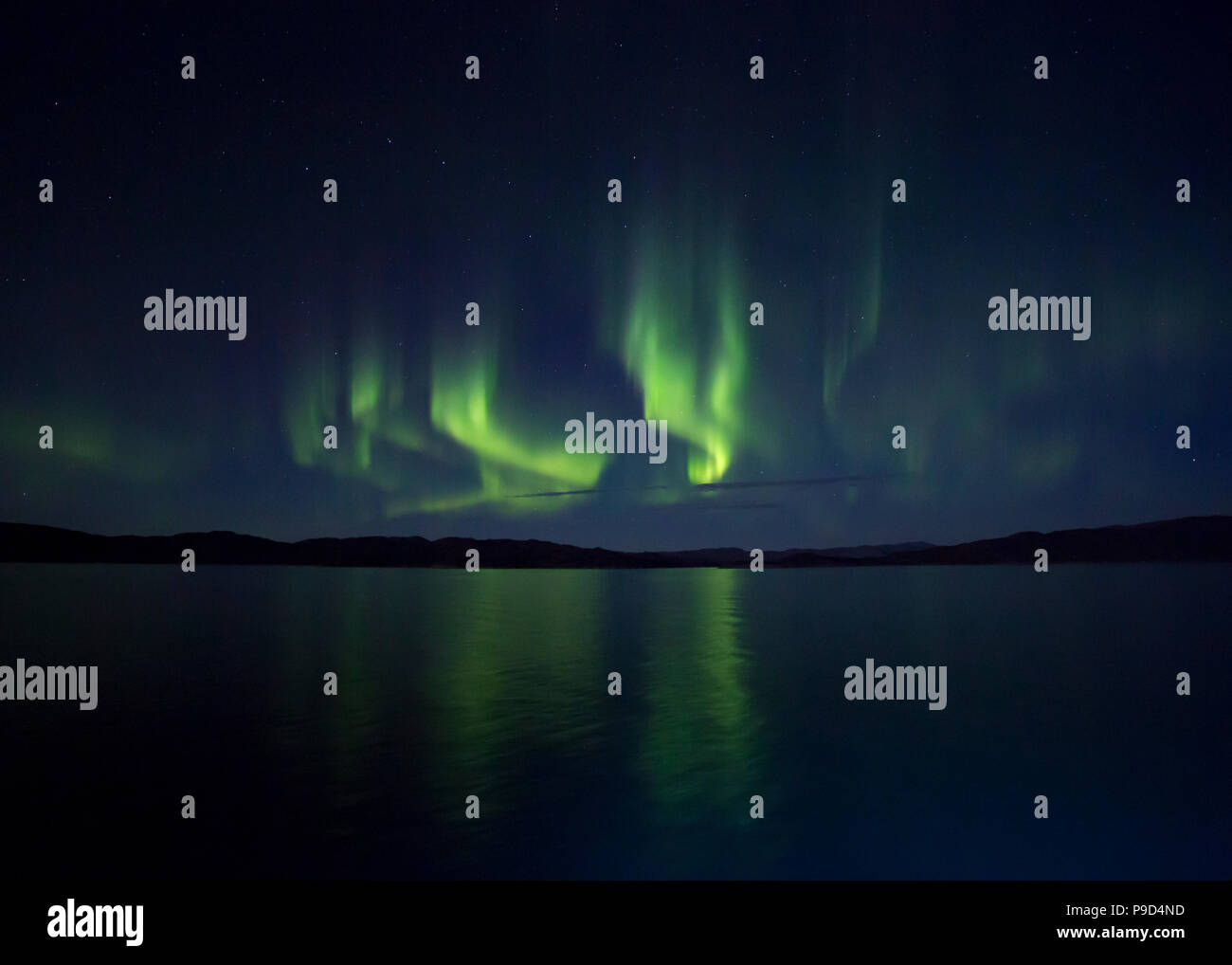 Arktis, Grönland. Der grüne Aurora Borealis-Tanz. Stockfoto