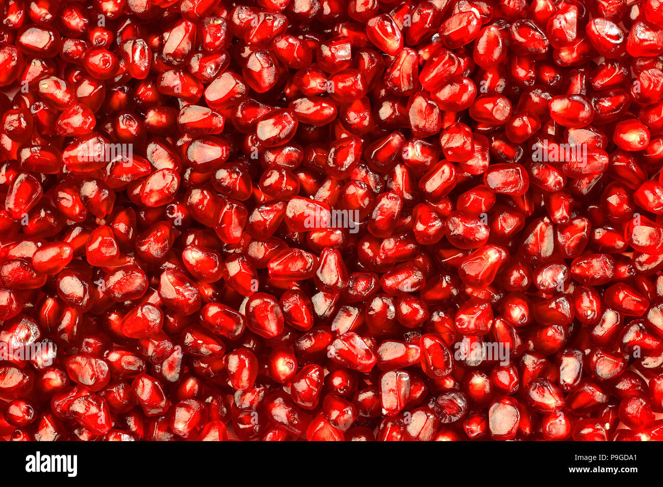 Körner von Reif und saftig Granatapfel Stockfoto